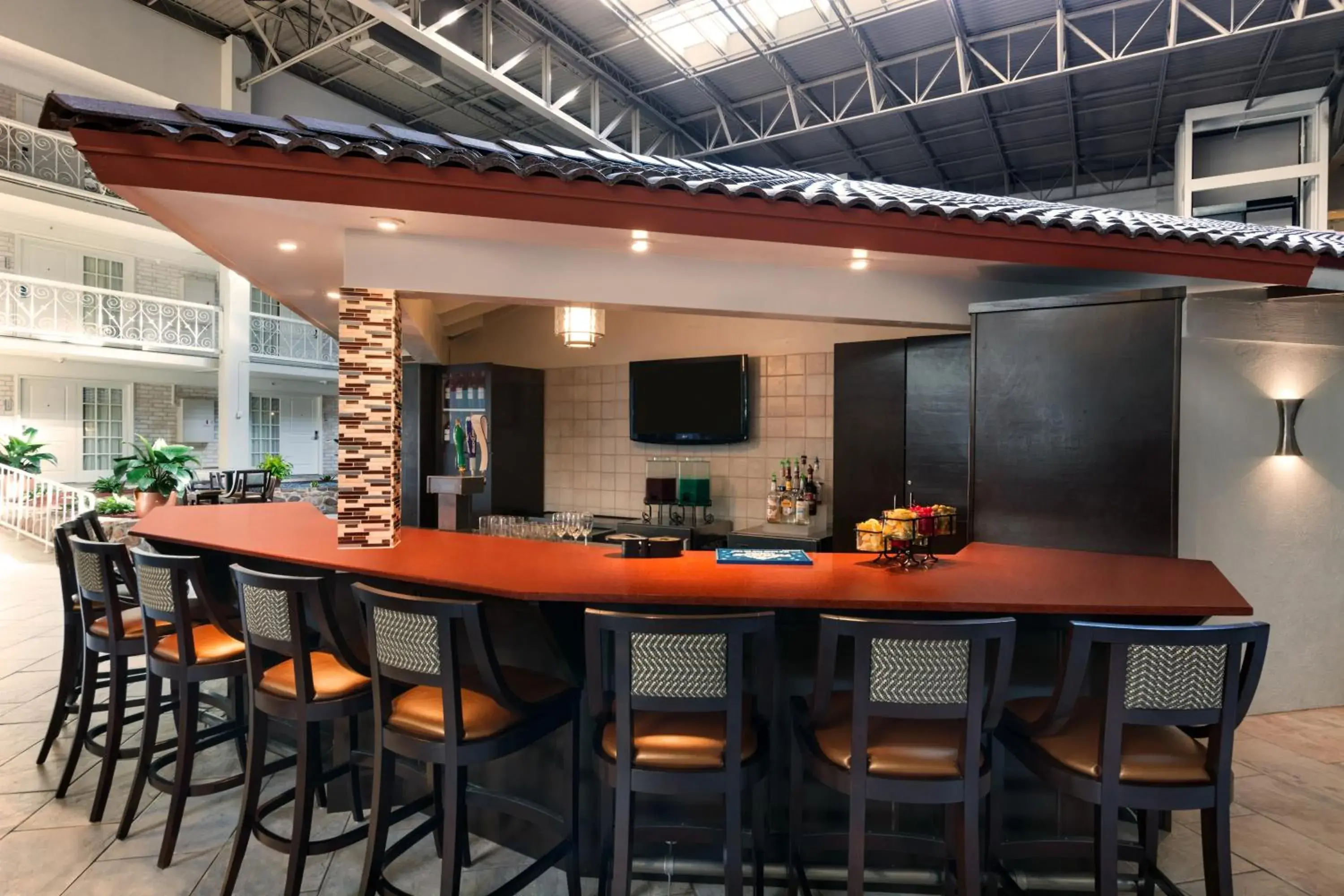 Lounge or bar in Embassy Suites Corpus Christi Lounge or bar in Embassy Suites Corpus Christi