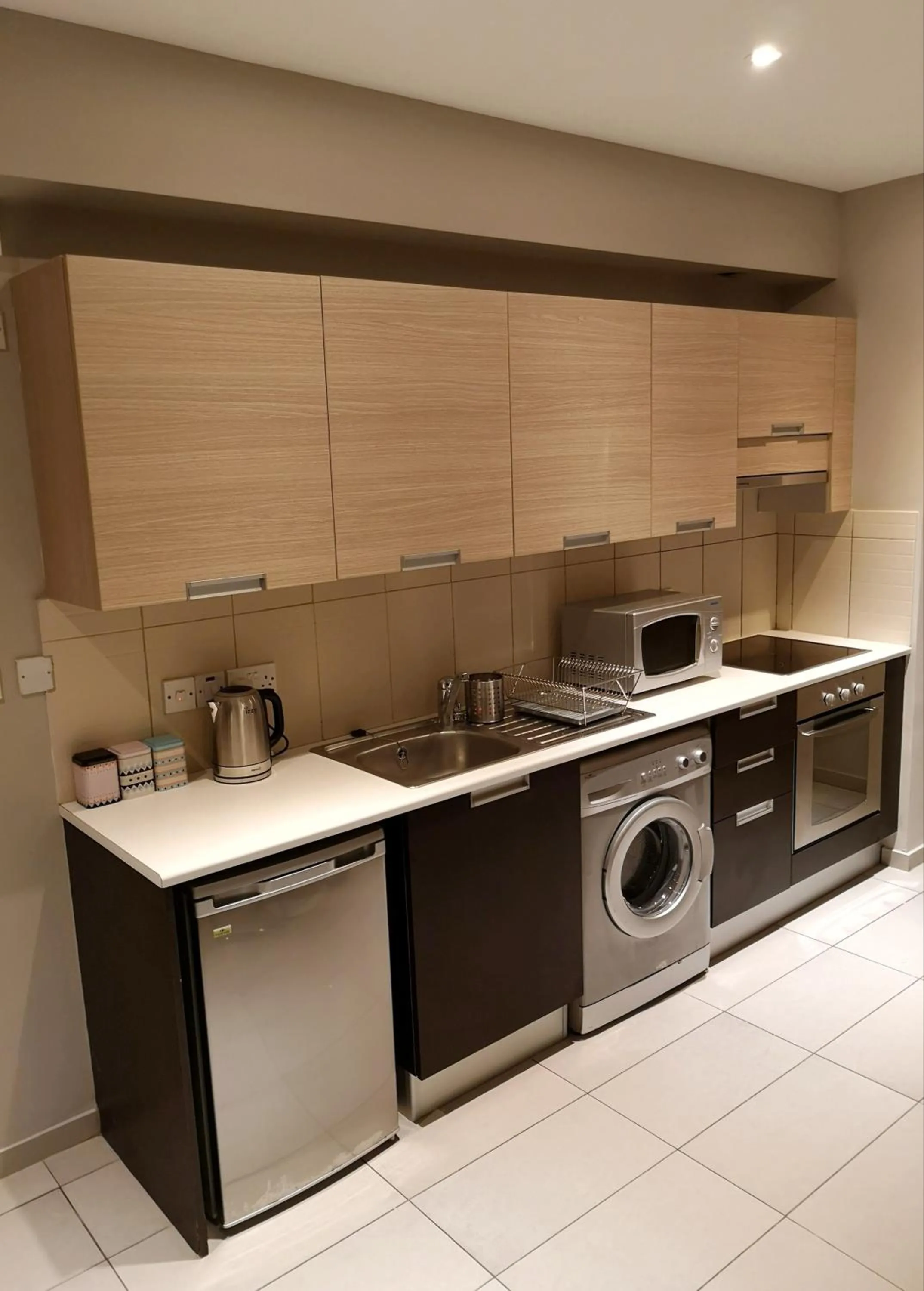 Kitchen or kitchenette in Beachfront Amazing New Apartment