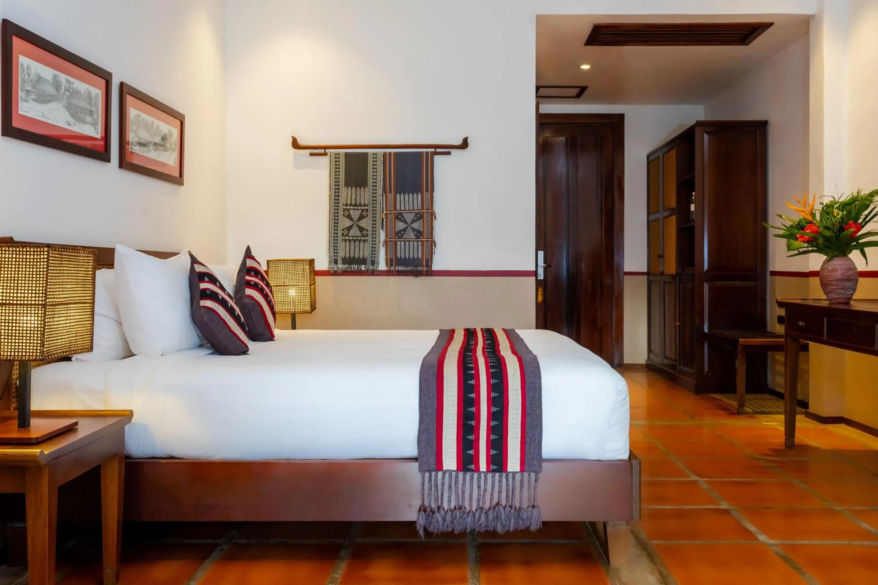 Bed in Riverside Boutique Resort, Vang Vieng