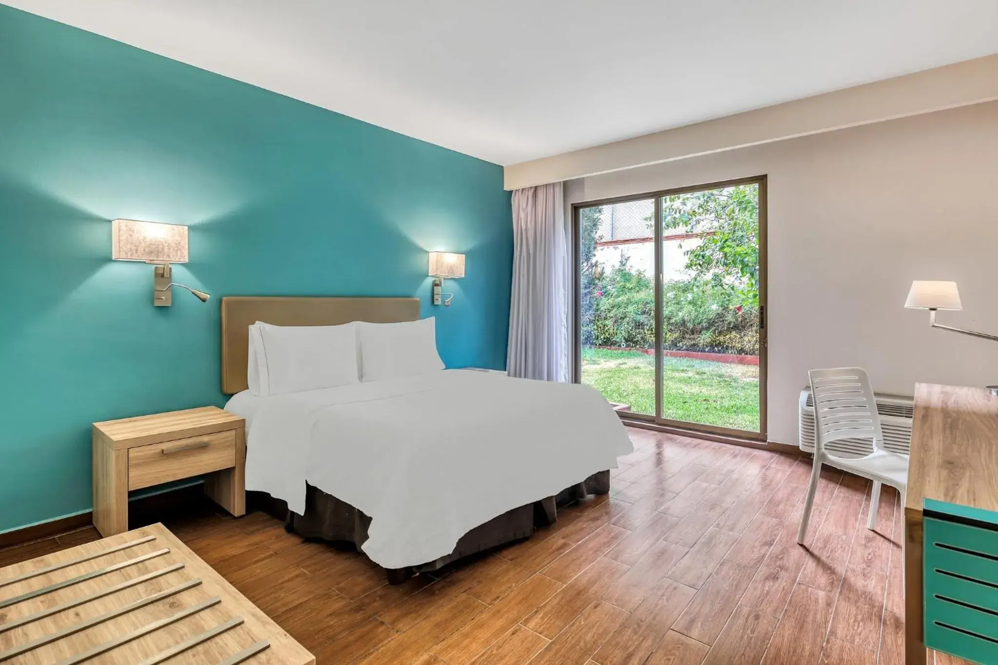 Photo of the whole room, Bed in Fiesta Inn Oaxaca Photo of the whole room, Bed in Fiesta Inn Oaxaca