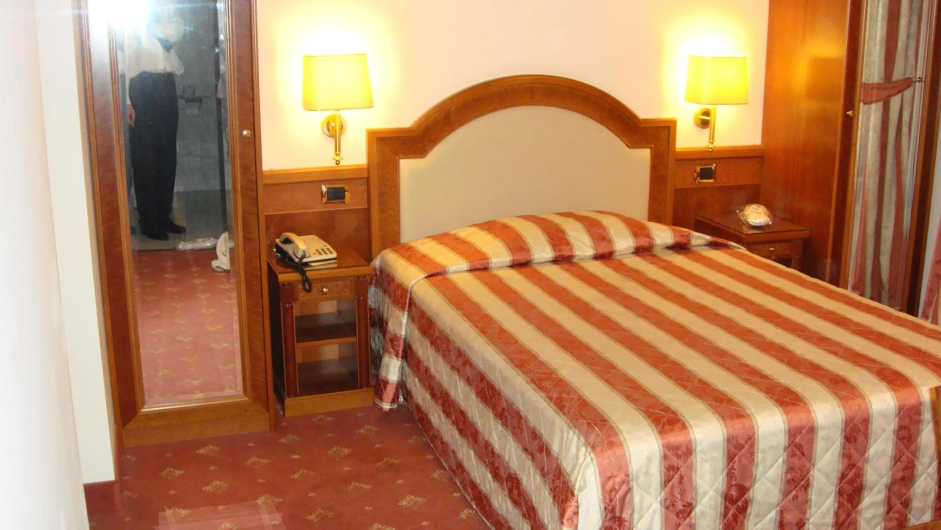 Bed in Albergo Corona