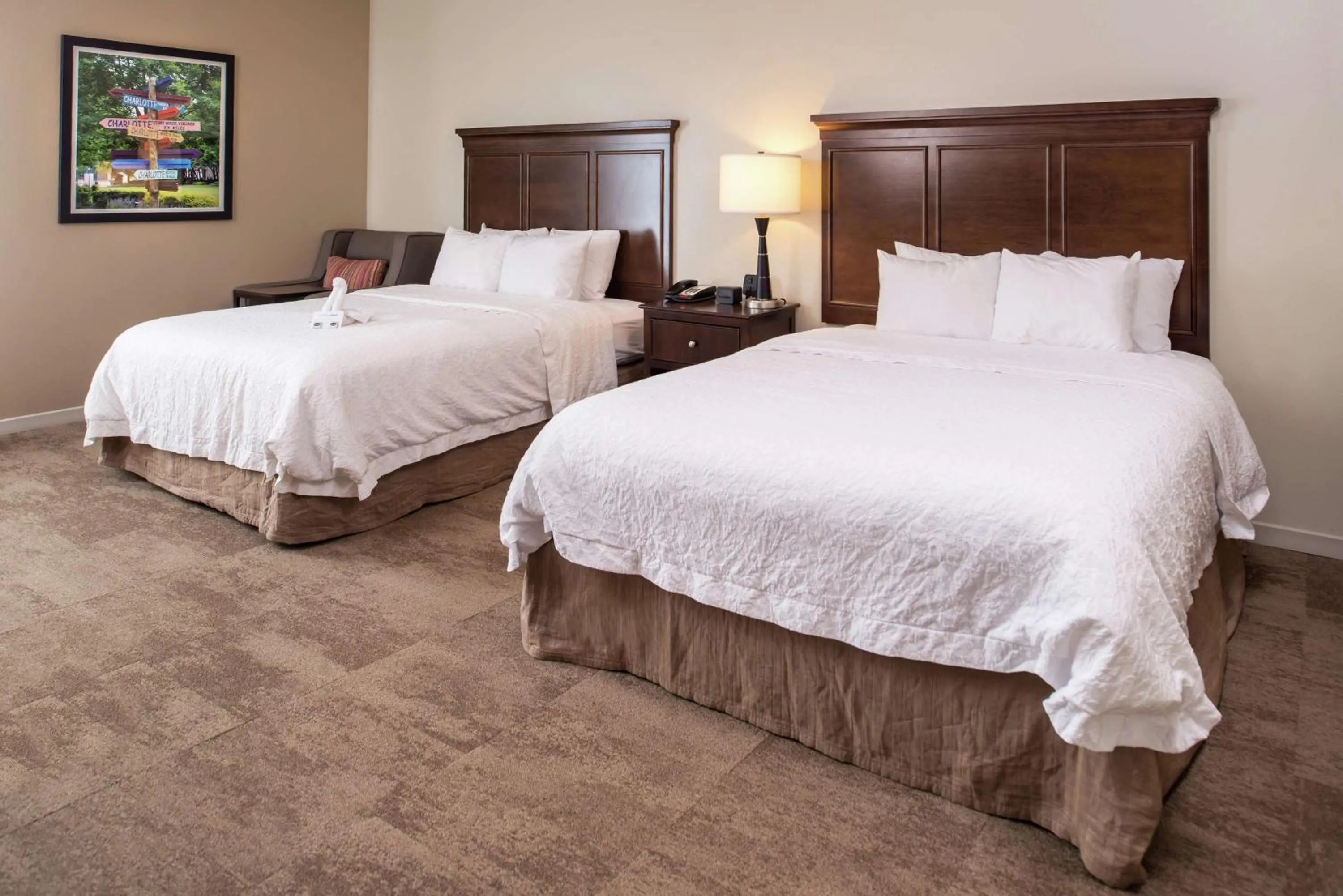 Bed in Hampton Inn & Suites Charlotte Arrowood Rd