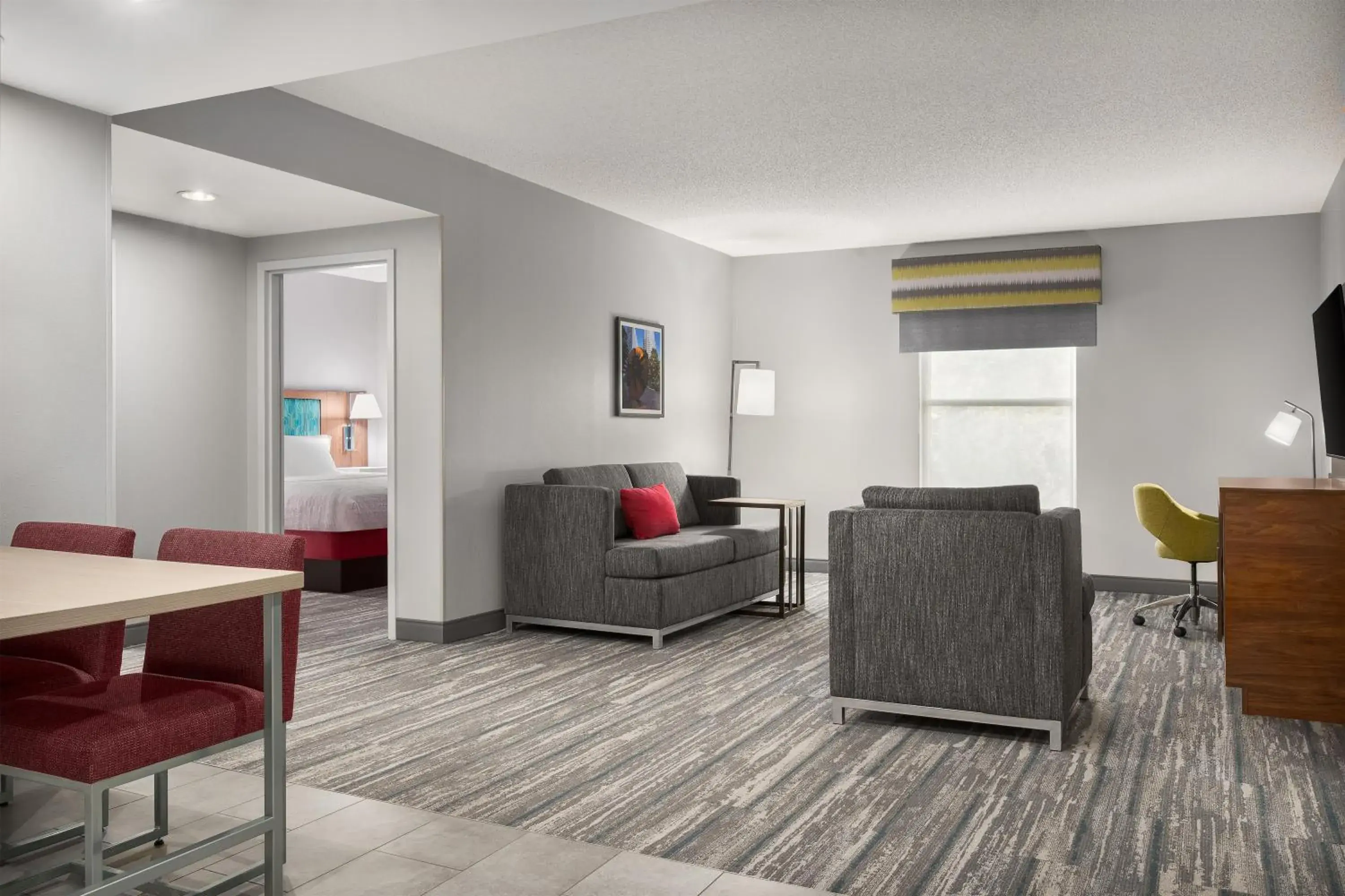 Living room in Hampton Inn & Suites Charlotte Arrowood Rd Living room in Hampton Inn & Suites Charlotte Arrowood Rd