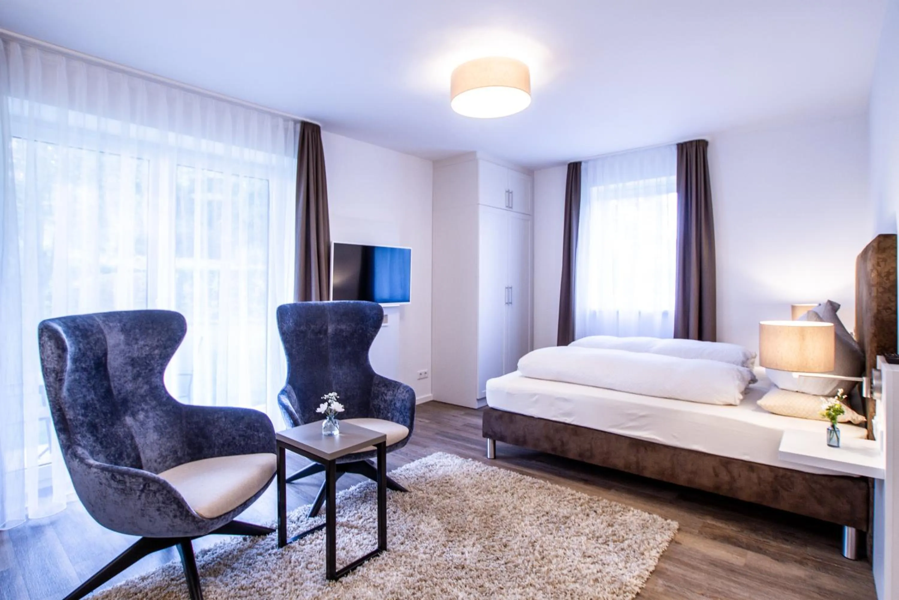 Bed in Appartements an der Golfanlage