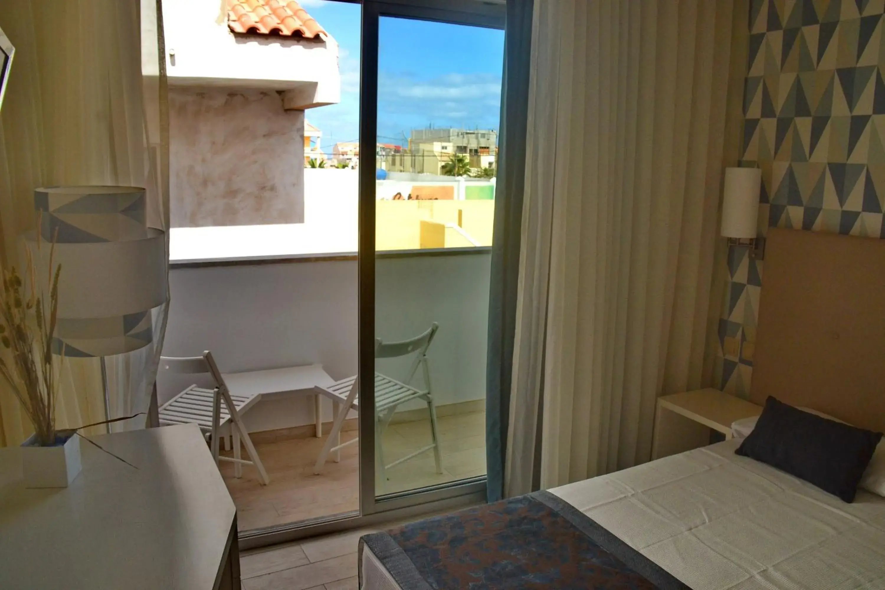 Balcony/Terrace, Bed in Ouril Hotel Julia Balcony/Terrace, Bed in Ouril Hotel Julia