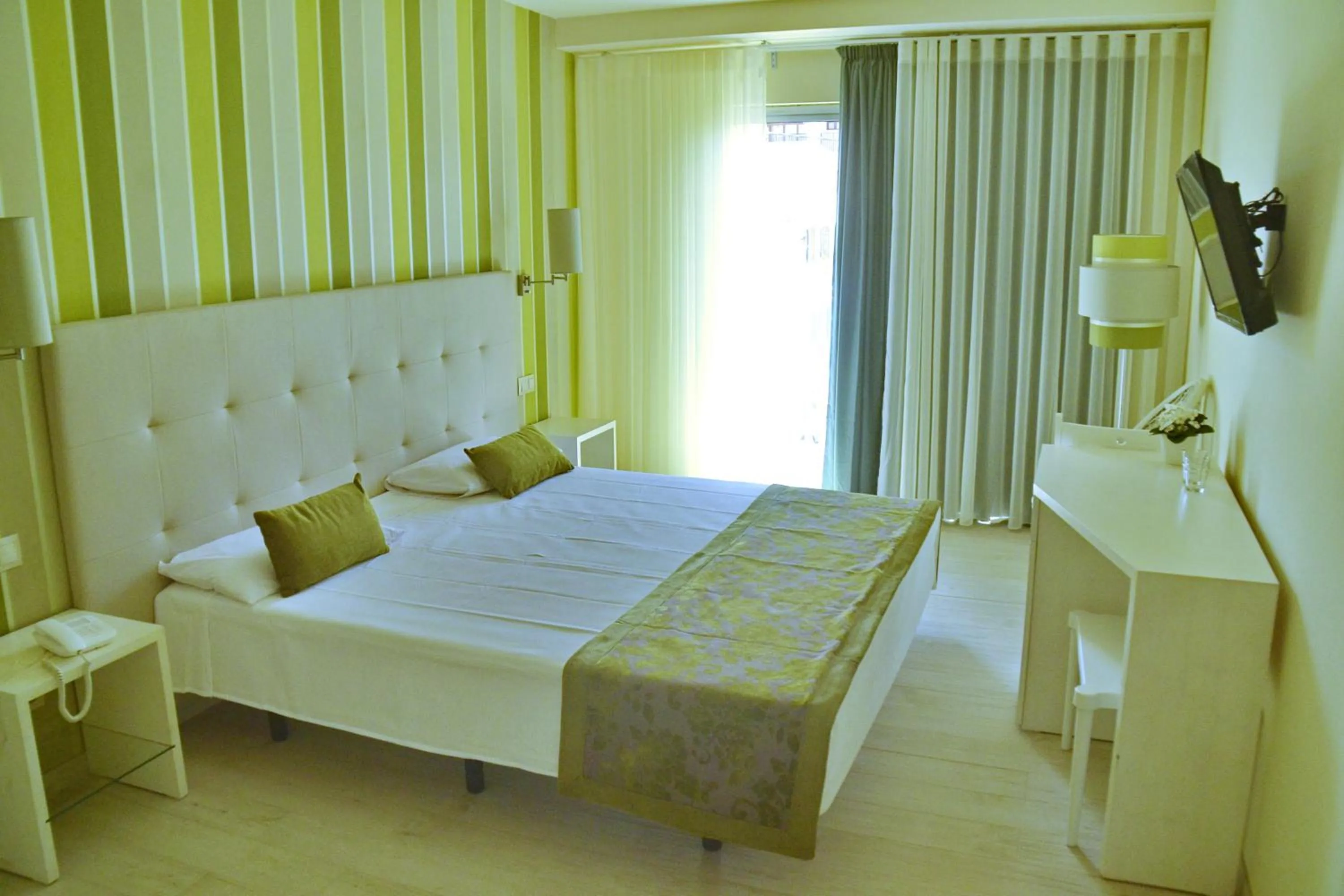 Bed in Ouril Hotel Julia