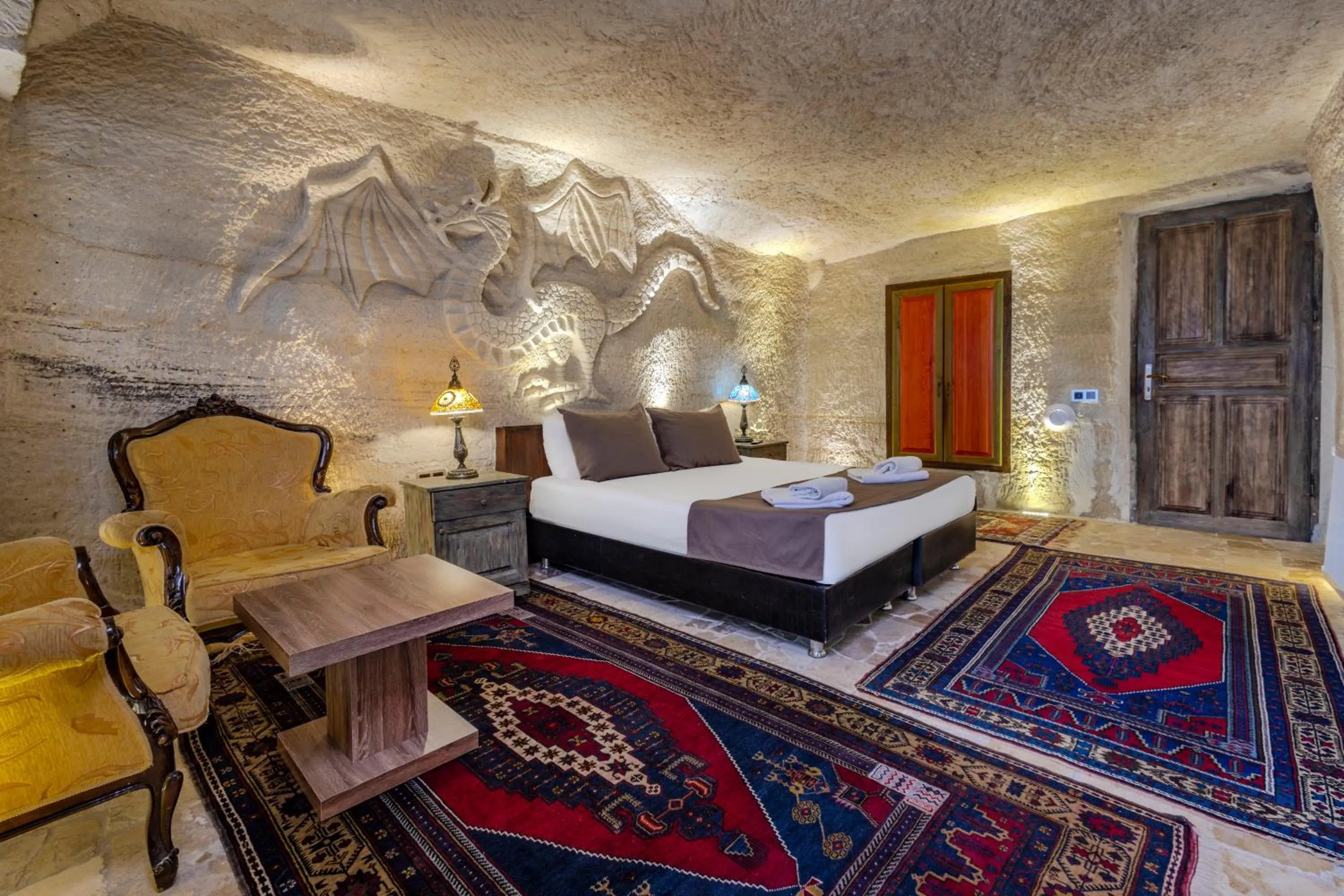 Bed in Kayatas Cave Suites