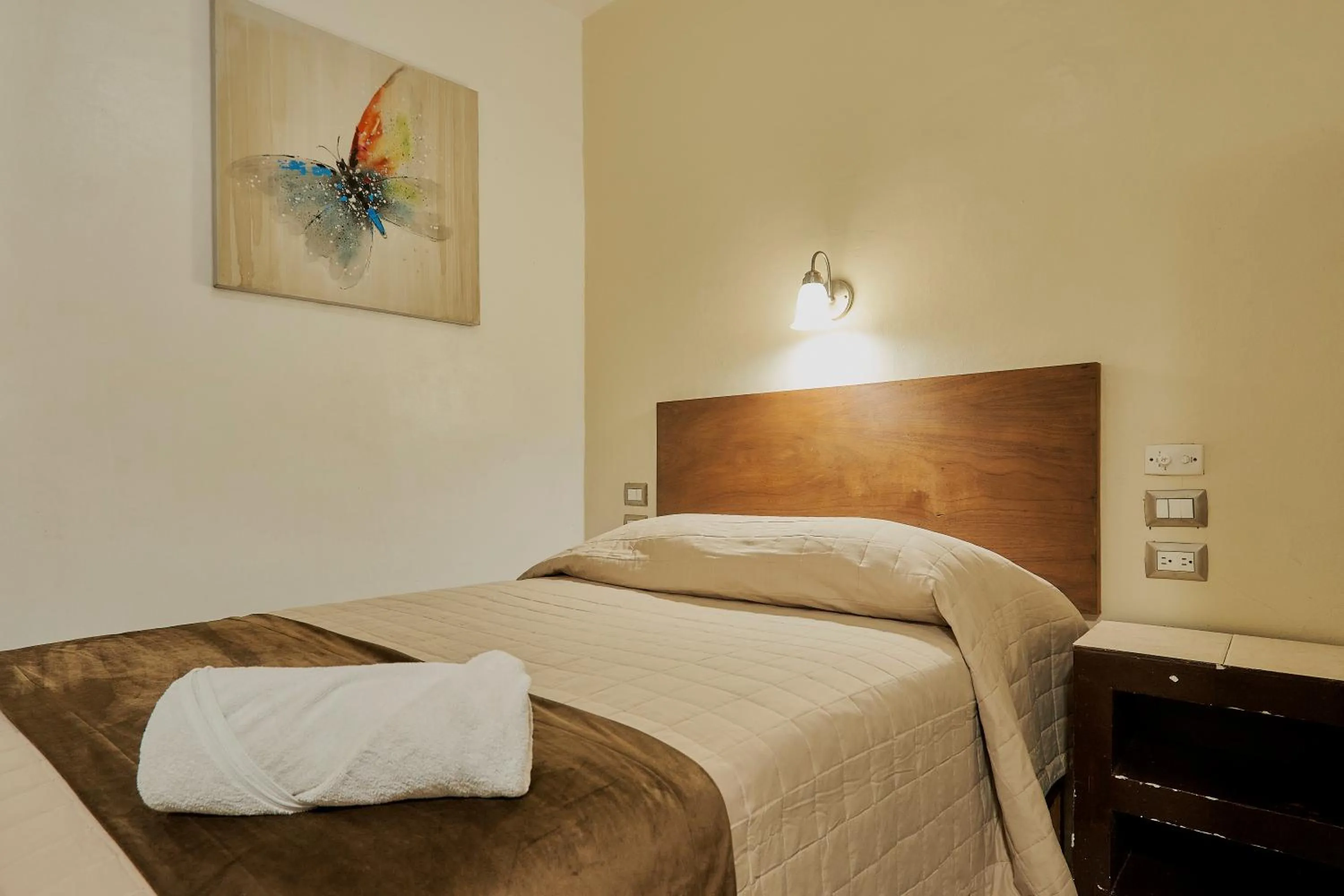 Bed in Hotel Cervantino