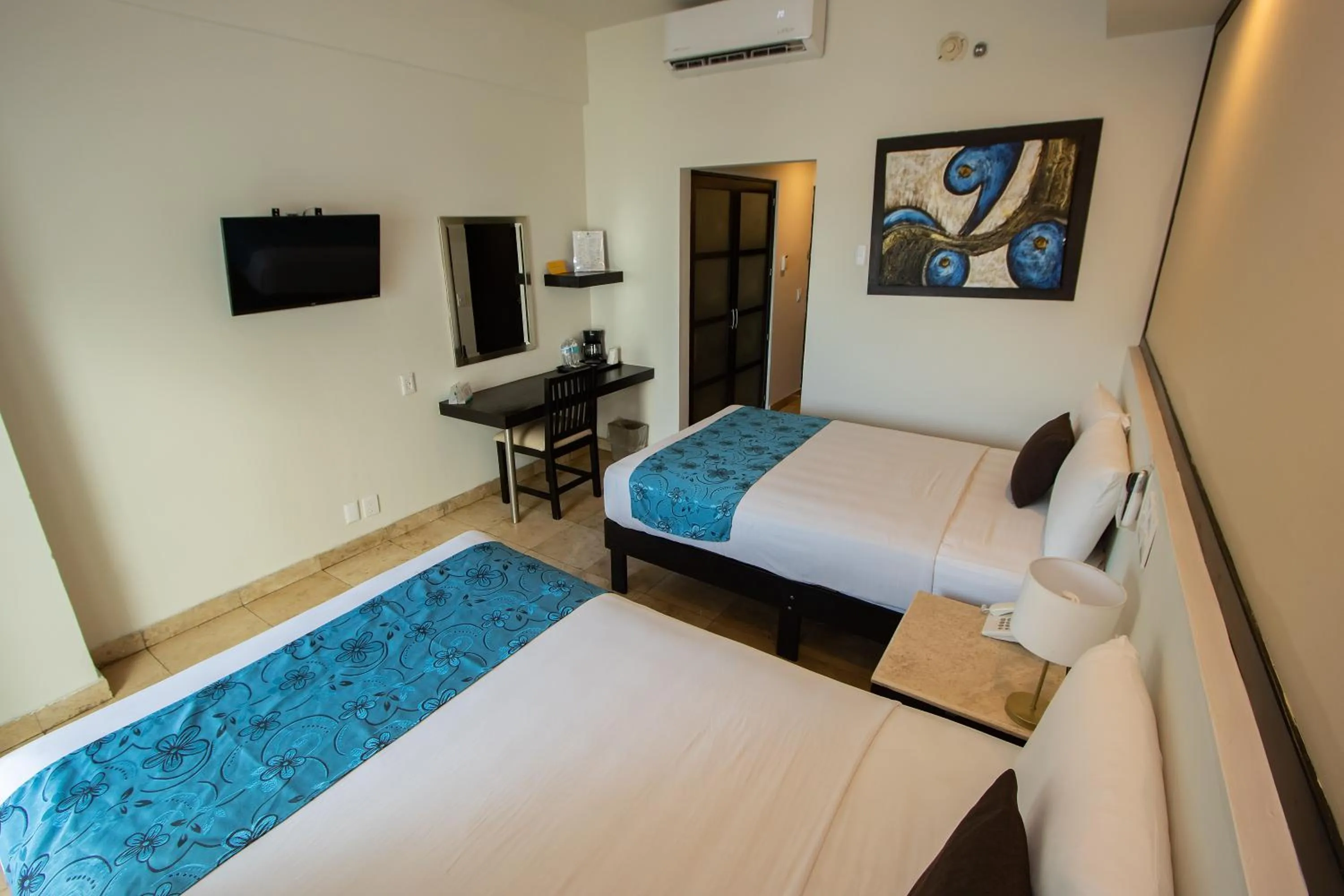 Bed in Coral Island Beach View Hotel