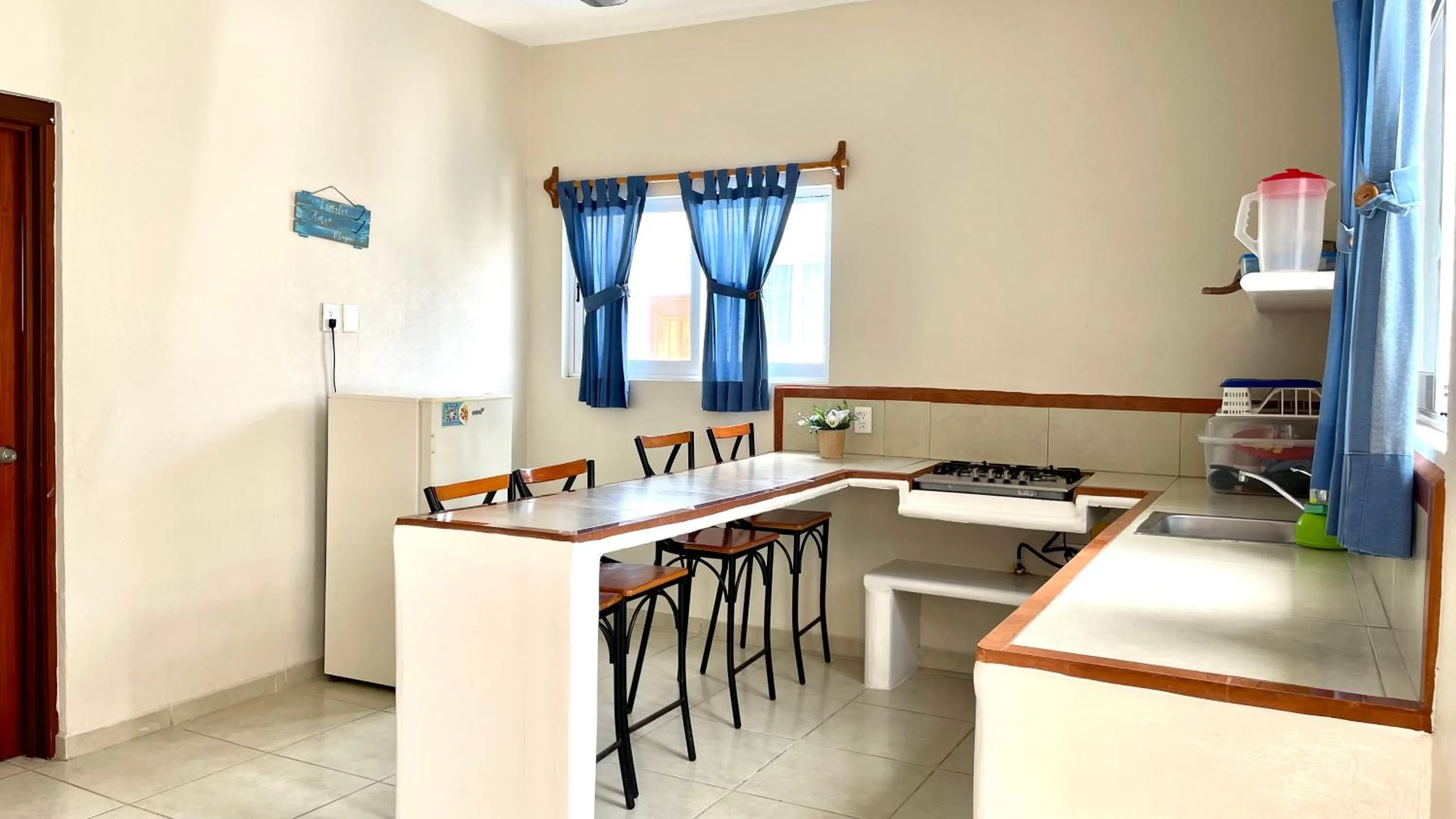 Kitchen or kitchenette in Bungalows Las Hamacas