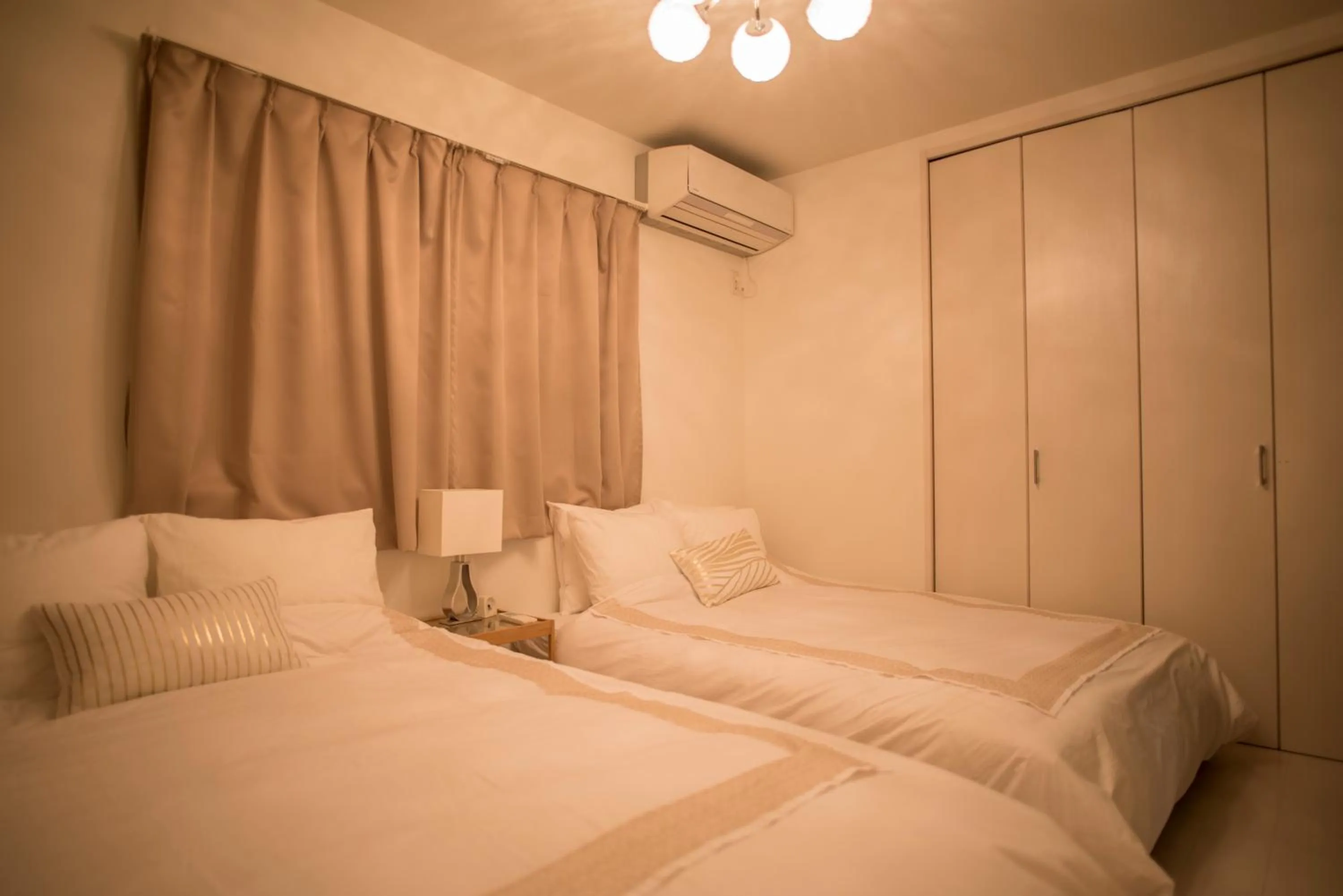 Bed in COCO Shinjuku HOTEL