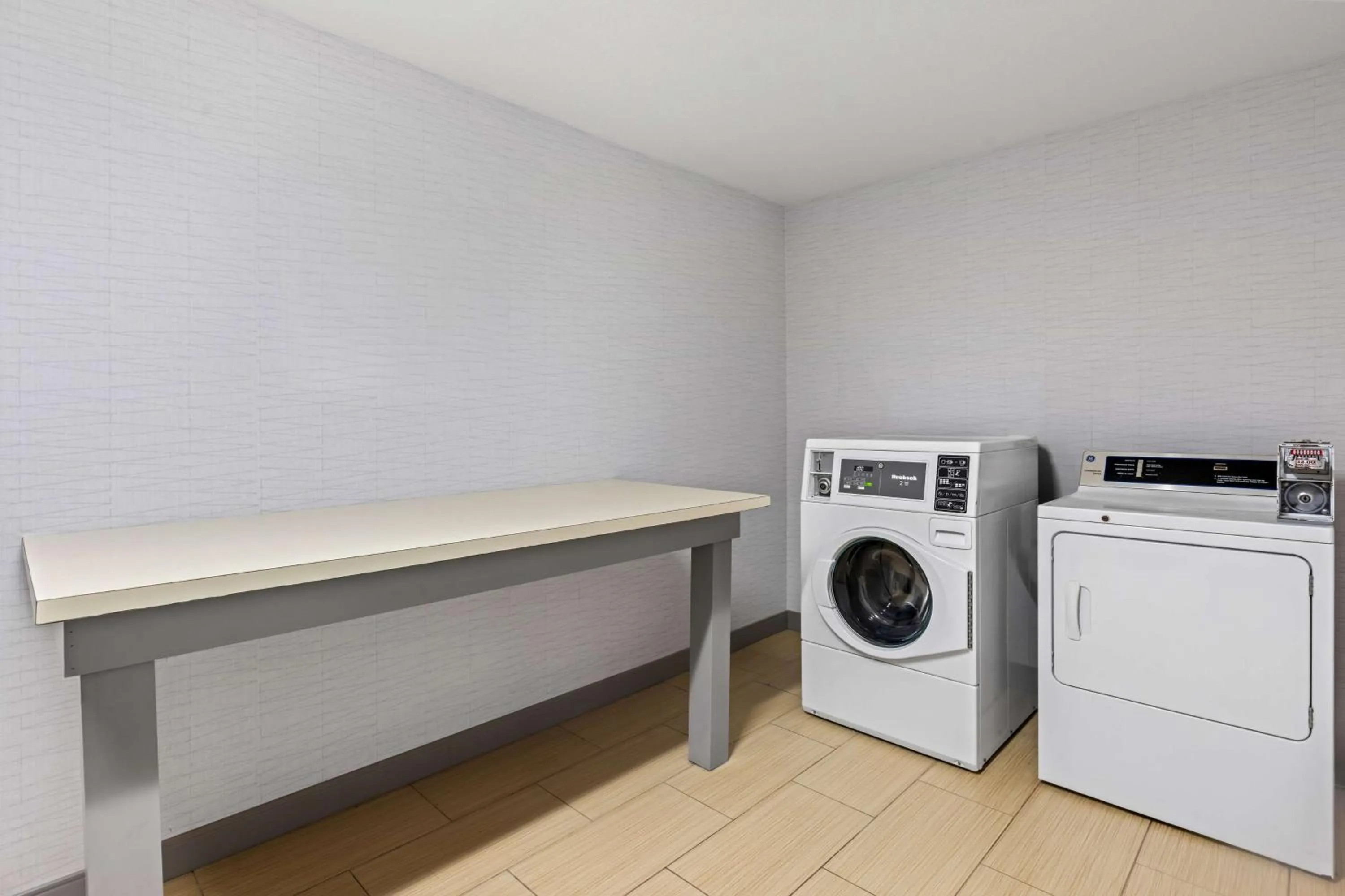 laundry in Spark by Hilton Port Wentworth Savannah