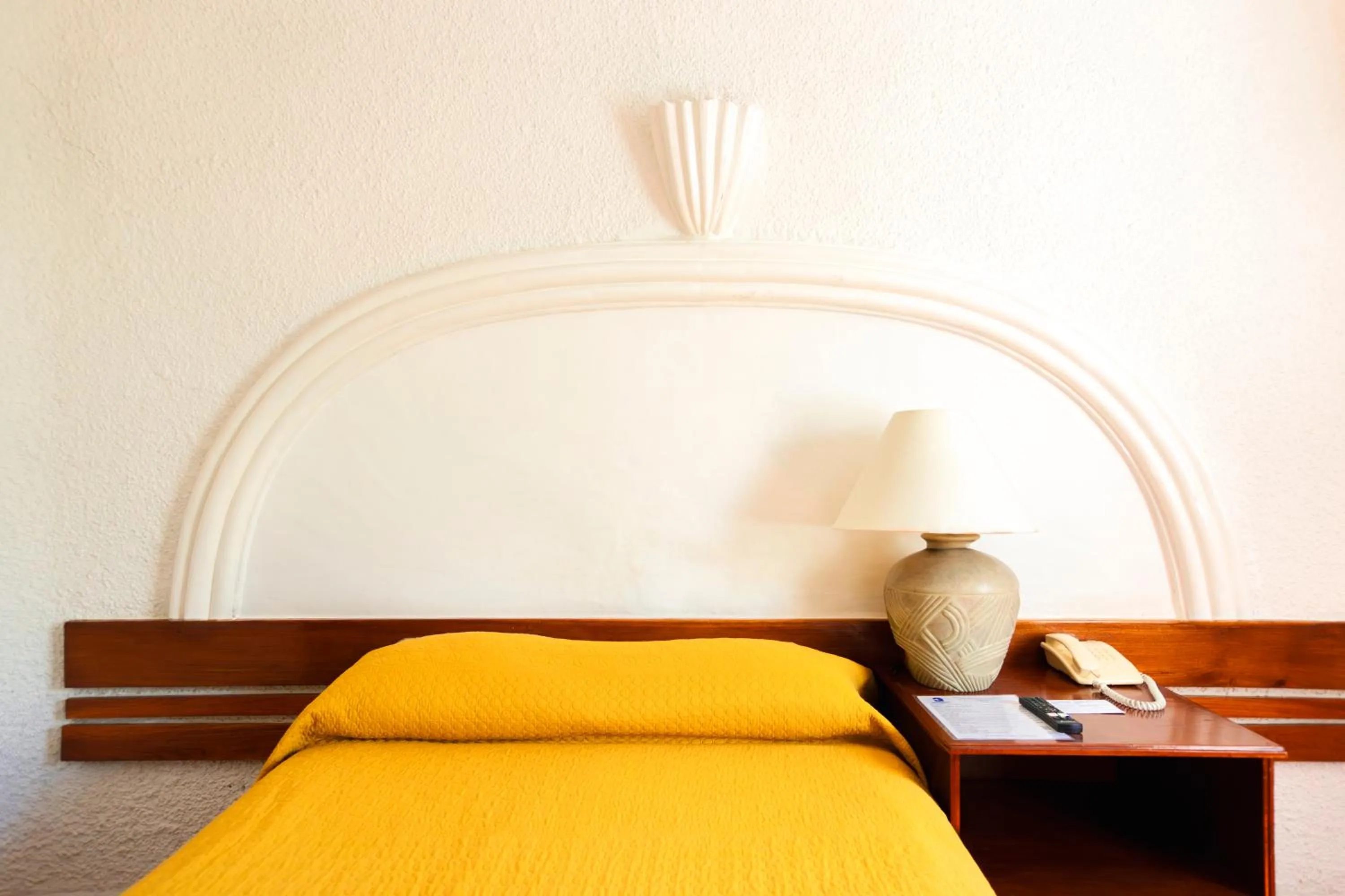 Bed in Hotel Antillano