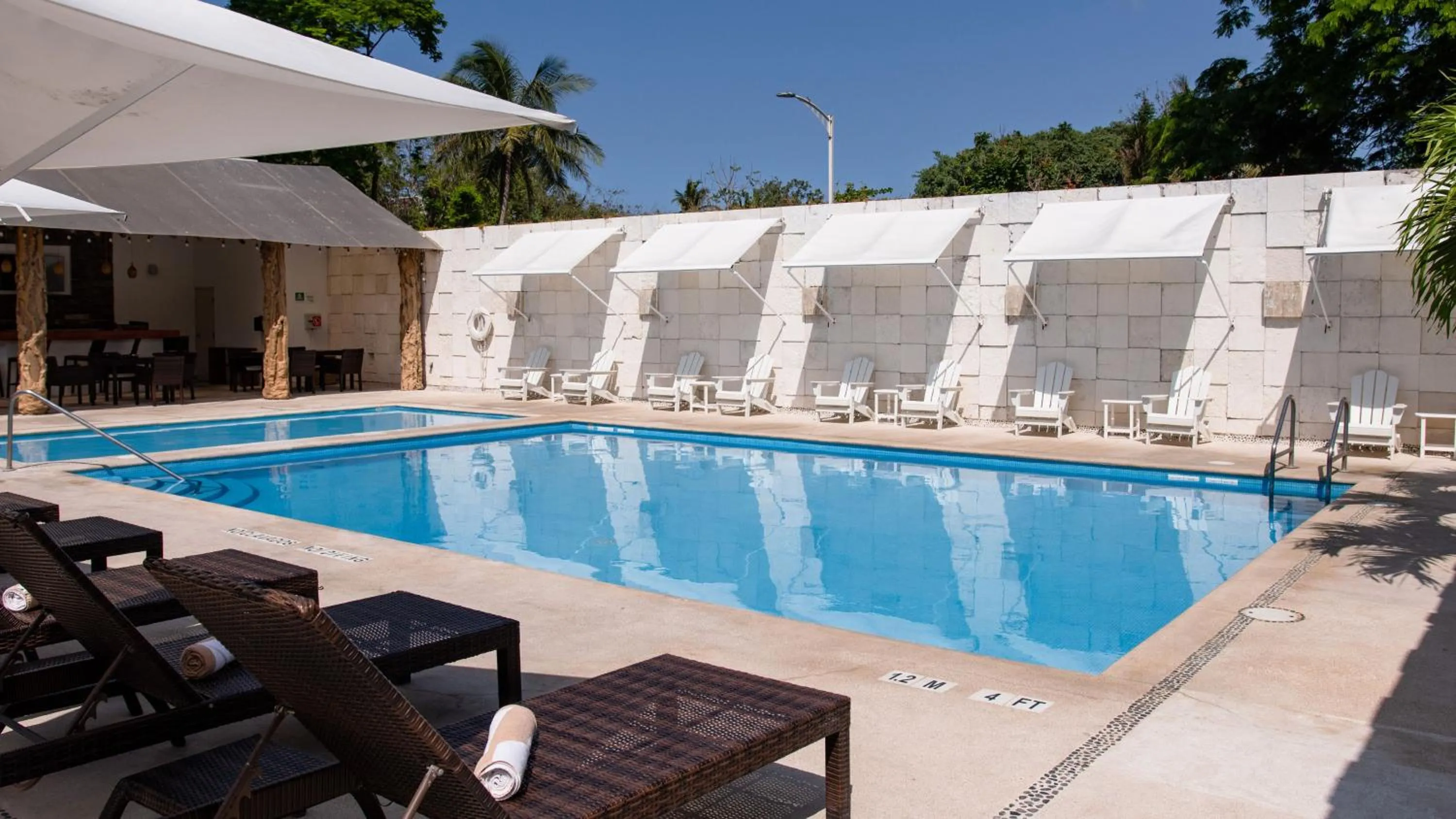 Swimming pool in Holiday Inn Acapulco La Isla by IHG