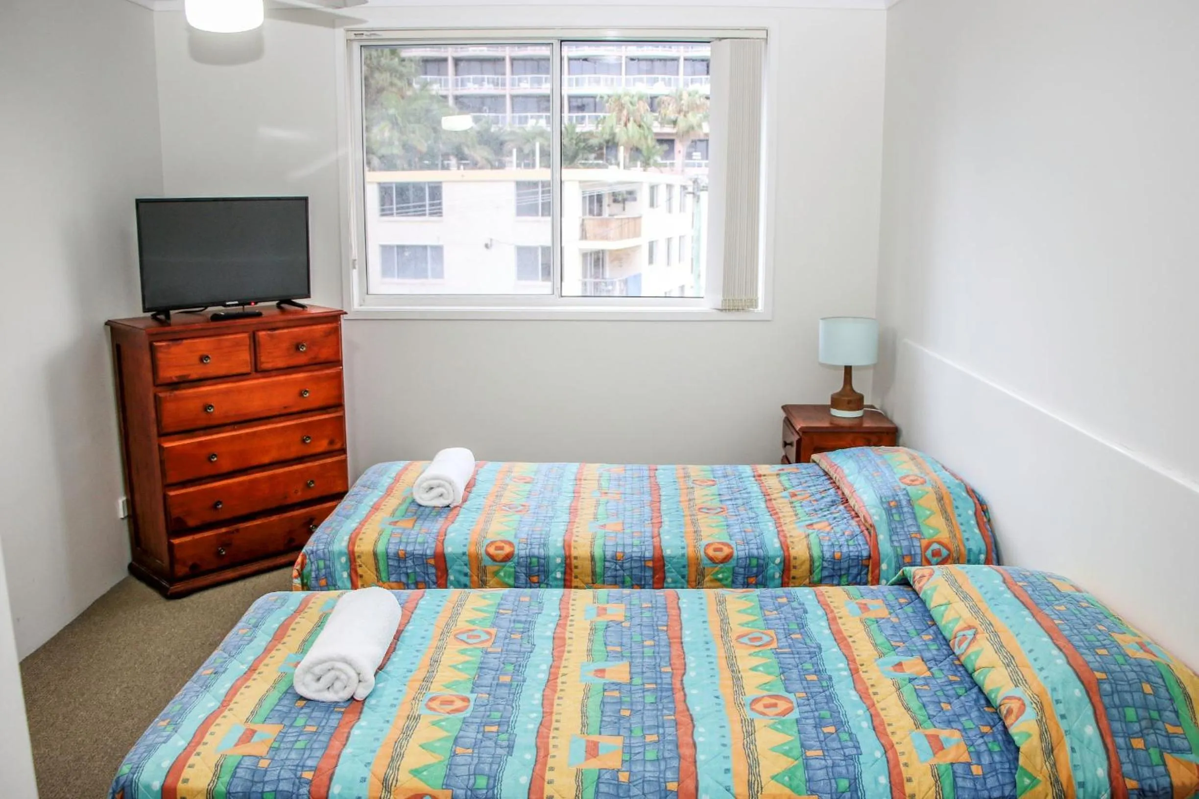 TV and multimedia, Bed in Surfers Beach Holiday Apartments