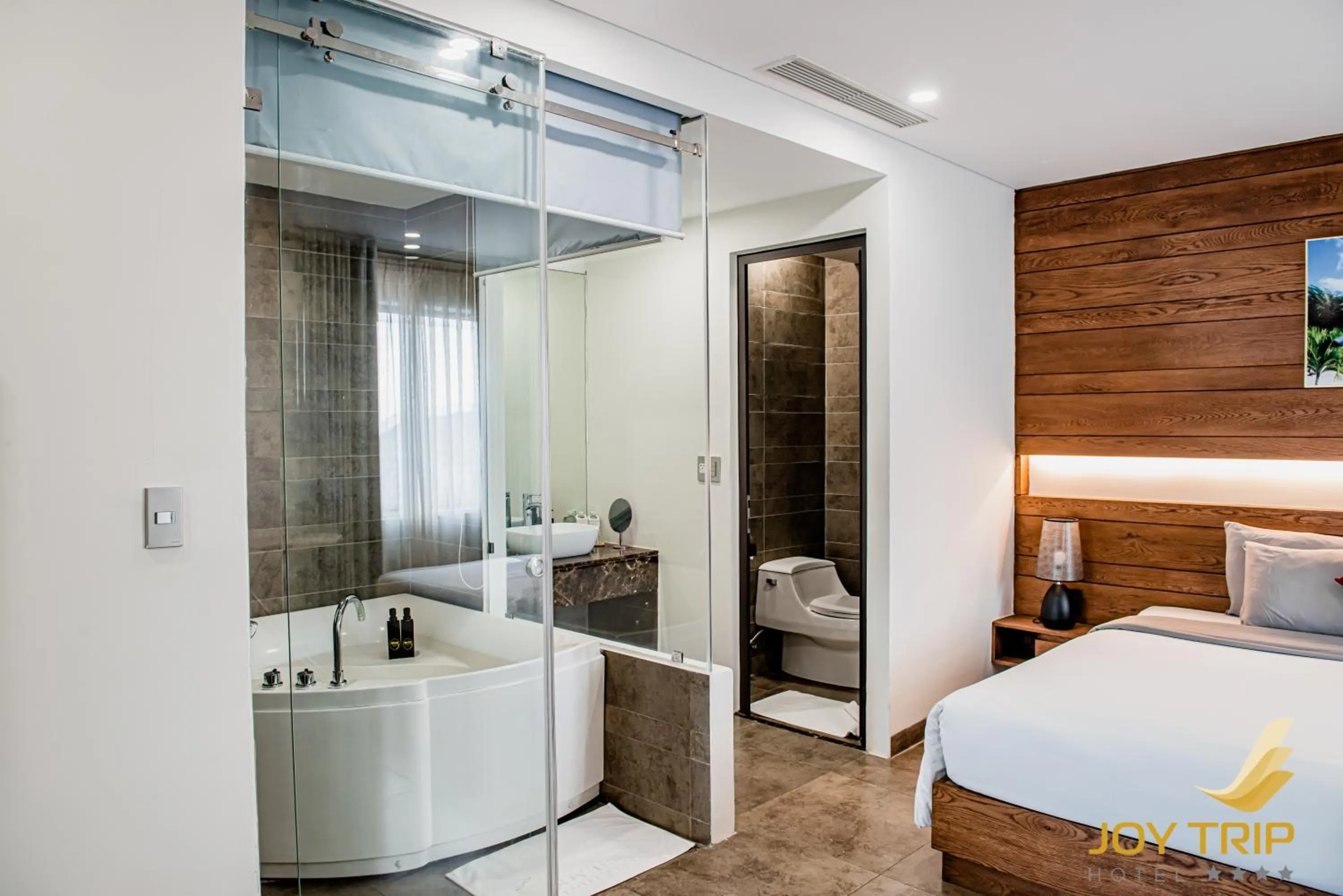 Shower, Bed in Joy Trip Hotel & Spa Nha Trang