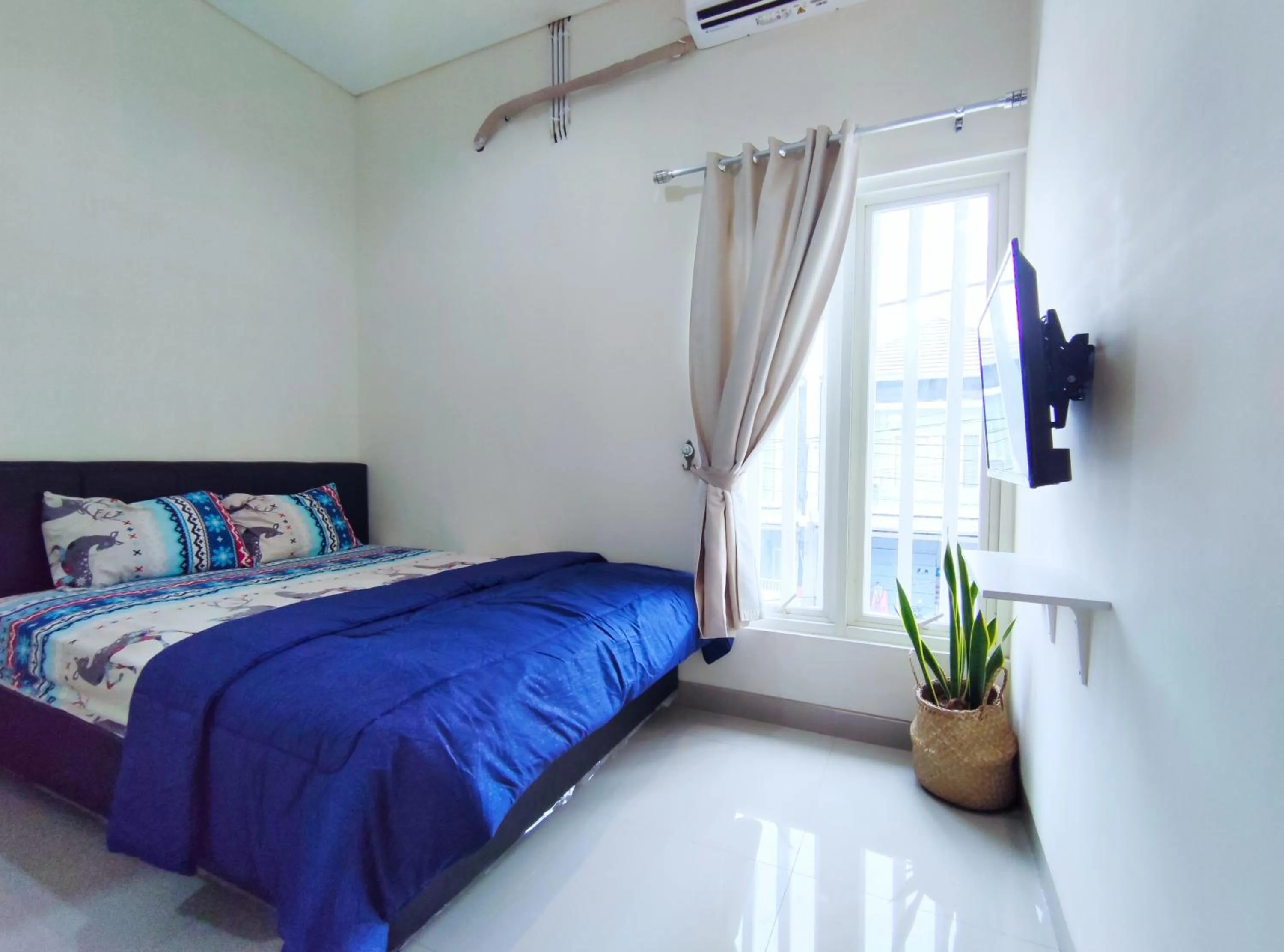 Bed in Surabaya Homey near Juanda Airport Syariah