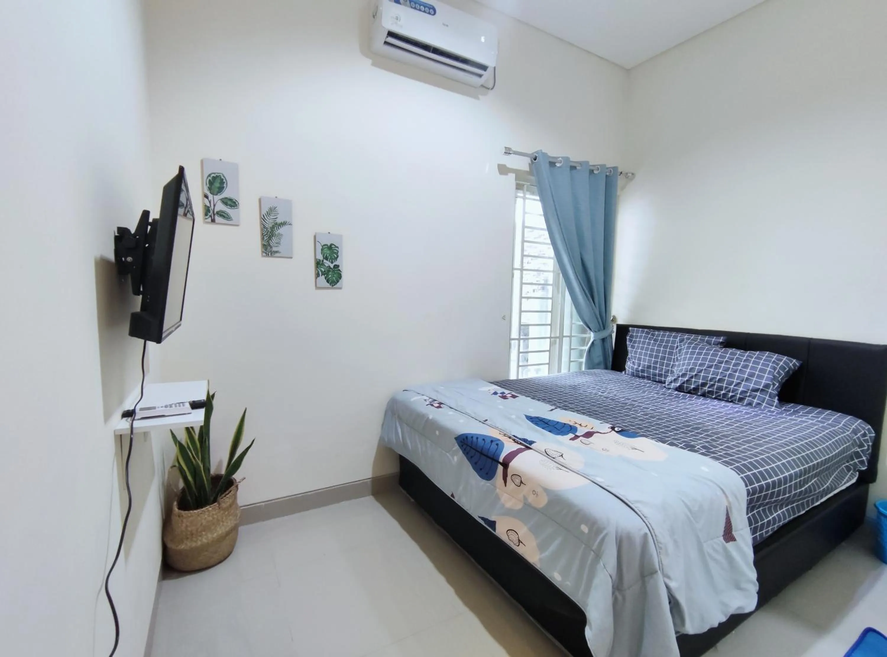Photo of the whole room, Bed in Surabaya Homey near Juanda Airport Syariah