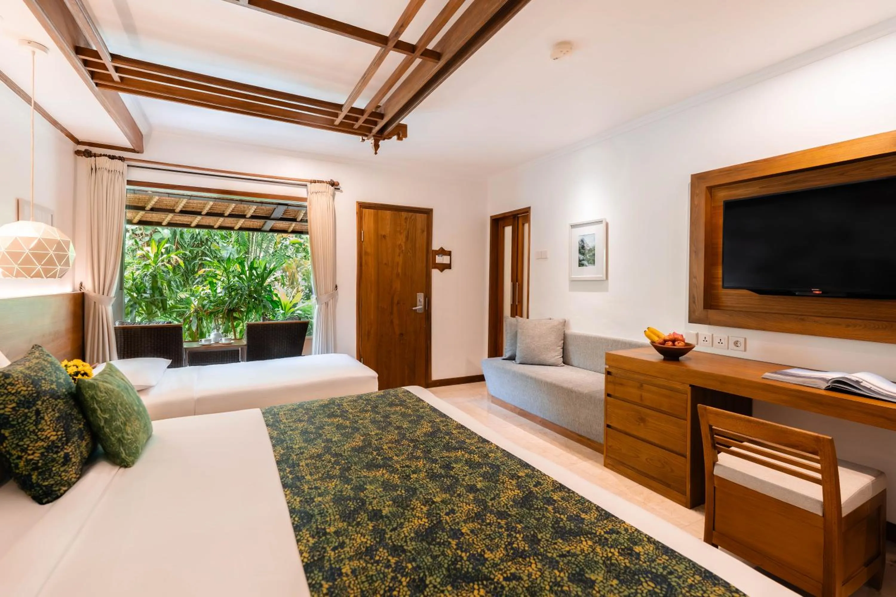 Bed in Legian Beach Hotel