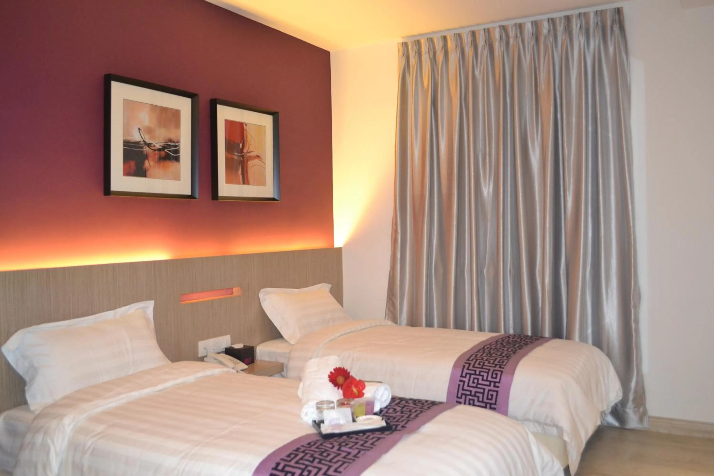 Bed in Ashley Boutique Hotel