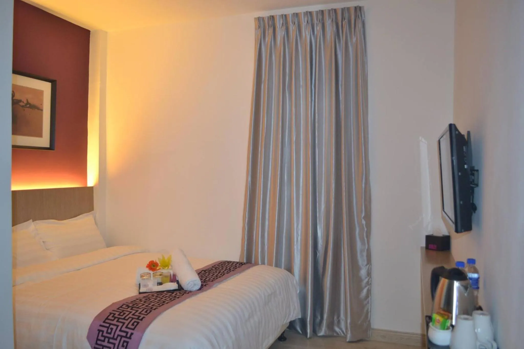 Bed in Ashley Boutique Hotel