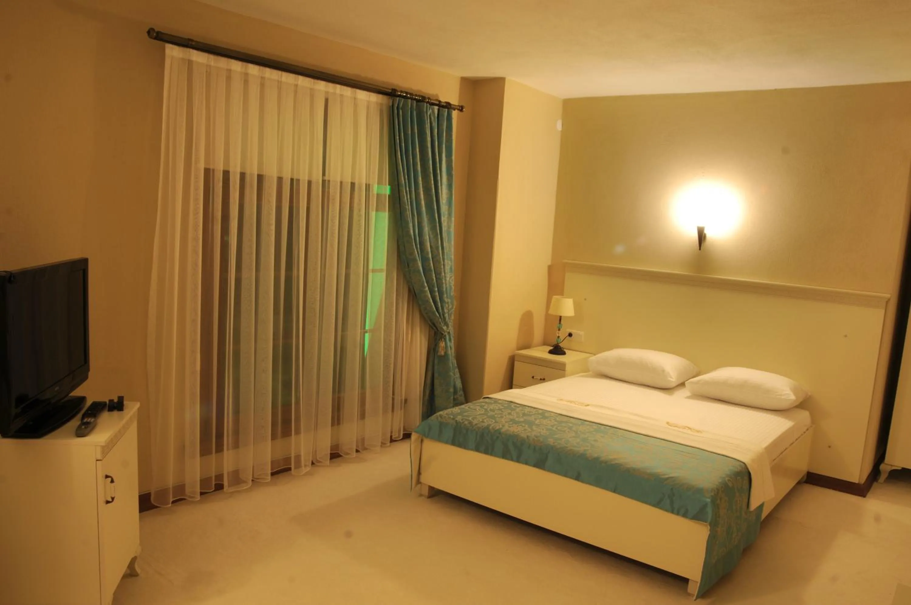 TV and multimedia, Bed in Casa Villa By Kirte