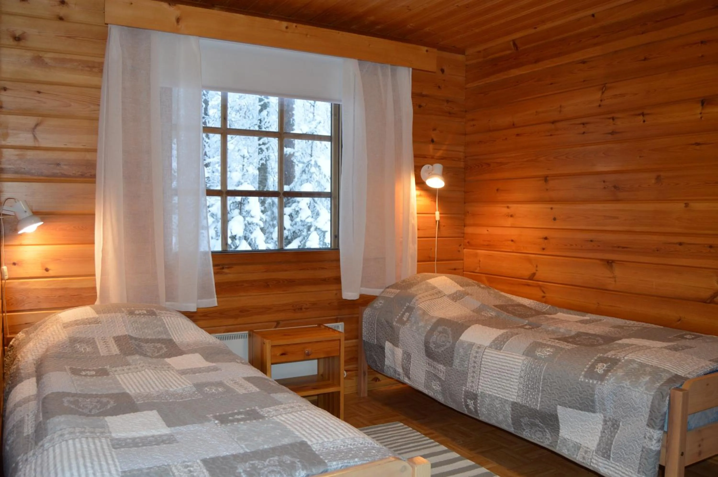 Bedroom, Bed in Rinnepelto Holiday Cottages