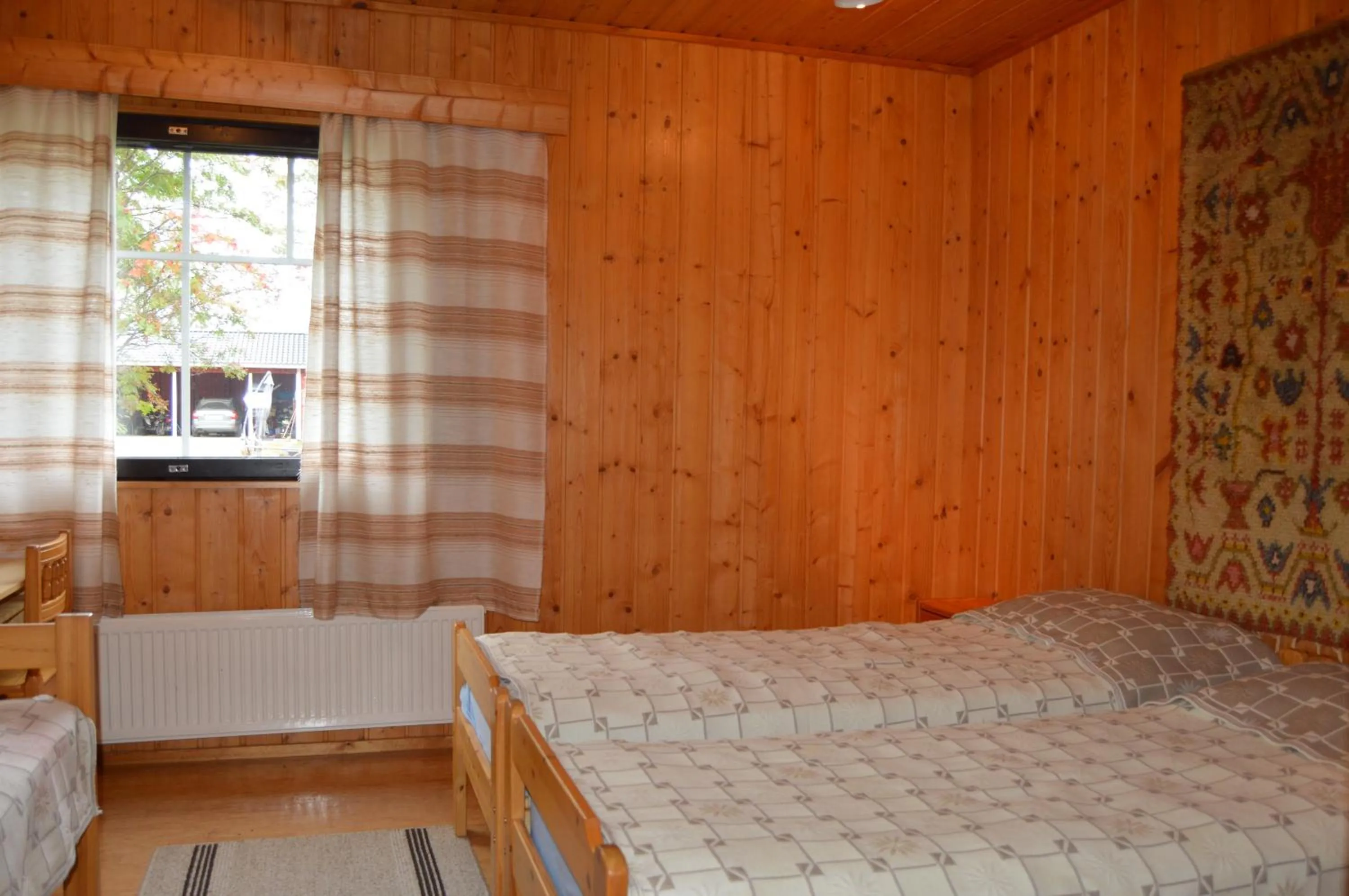 Photo of the whole room, Bed in Rinnepelto Holiday Cottages
