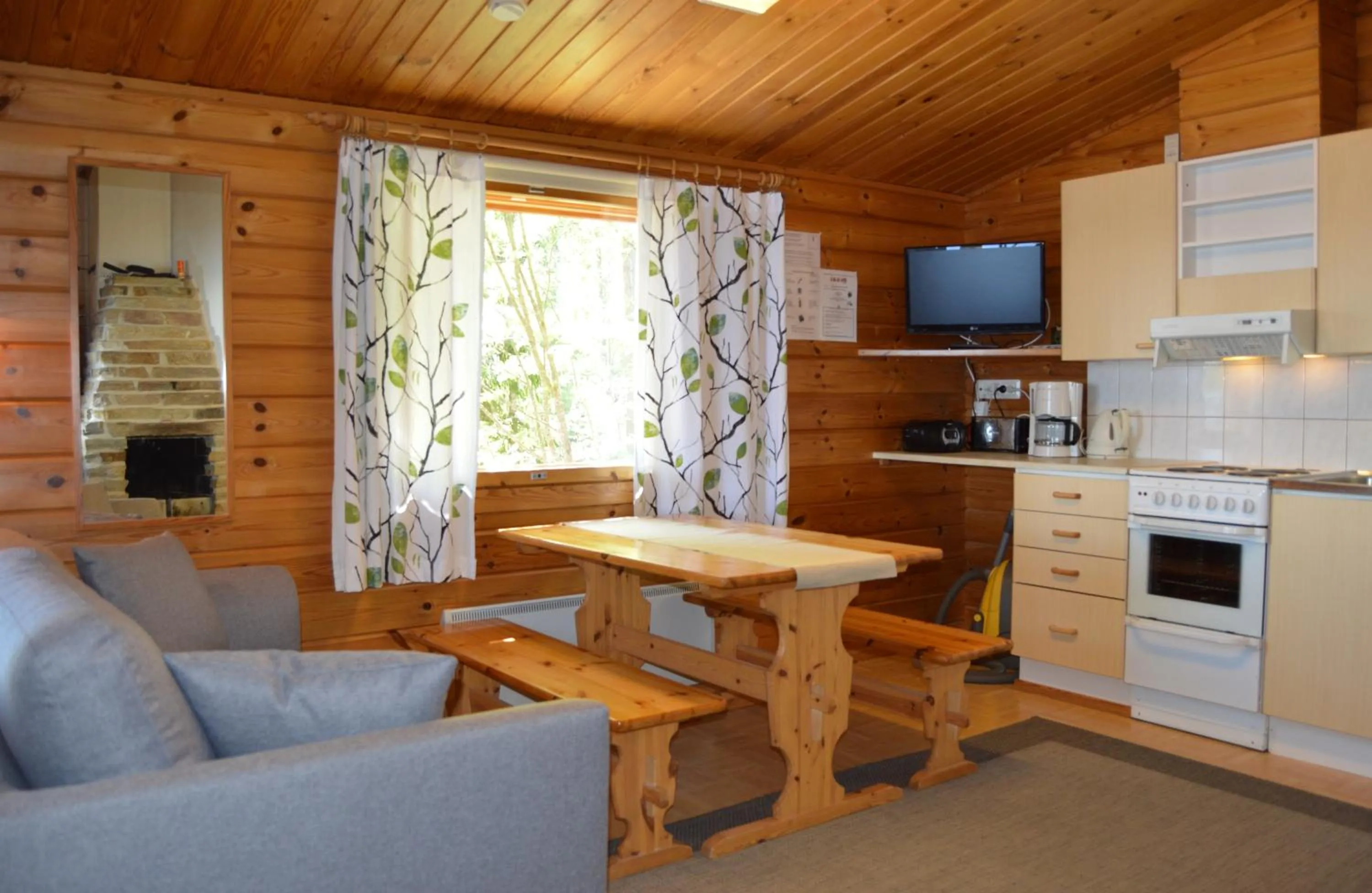 Kitchen or kitchenette in Rinnepelto Holiday Cottages