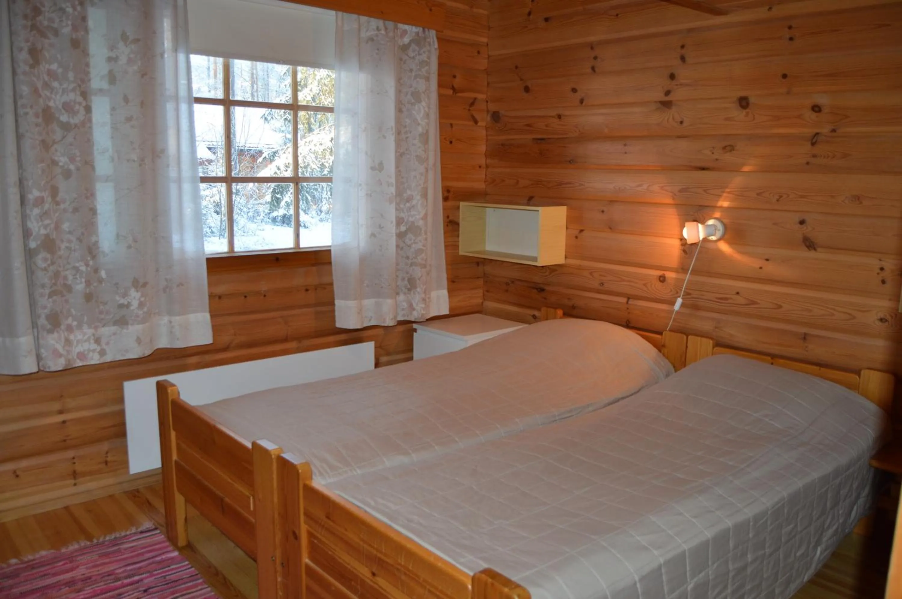 Bedroom, Bed in Rinnepelto Holiday Cottages