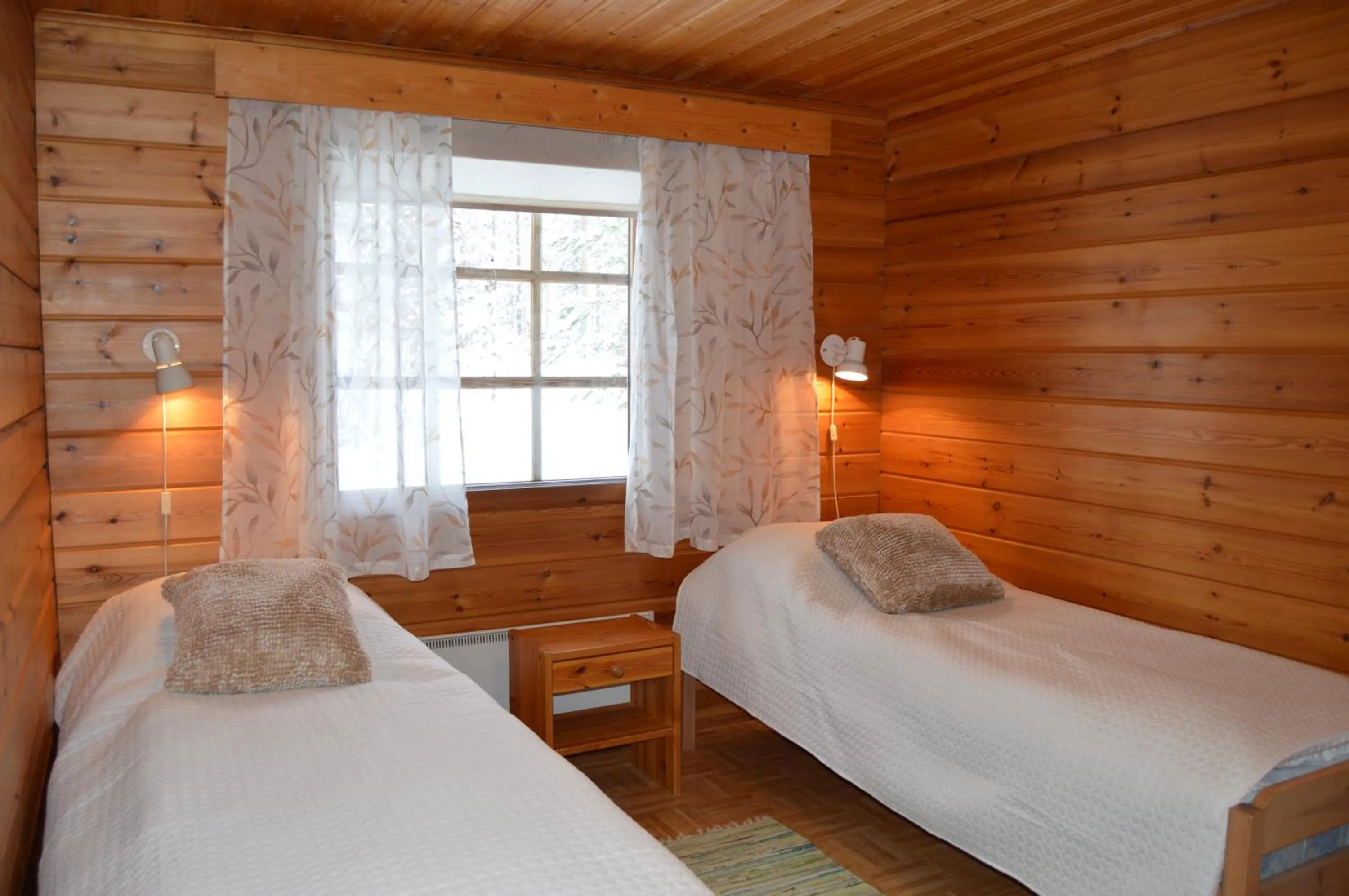 Bedroom, Bed in Rinnepelto Holiday Cottages