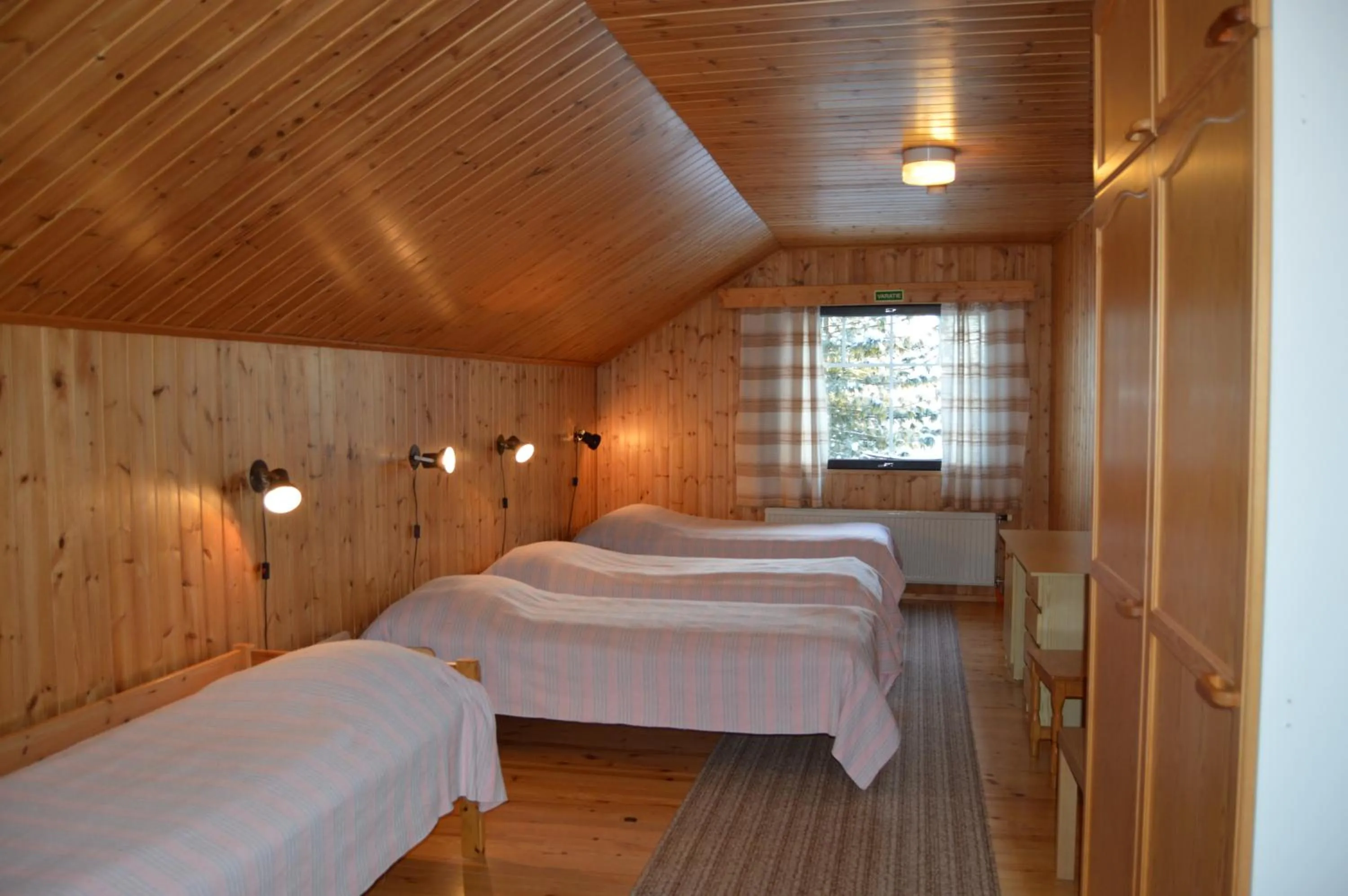Bedroom in Rinnepelto Holiday Cottages