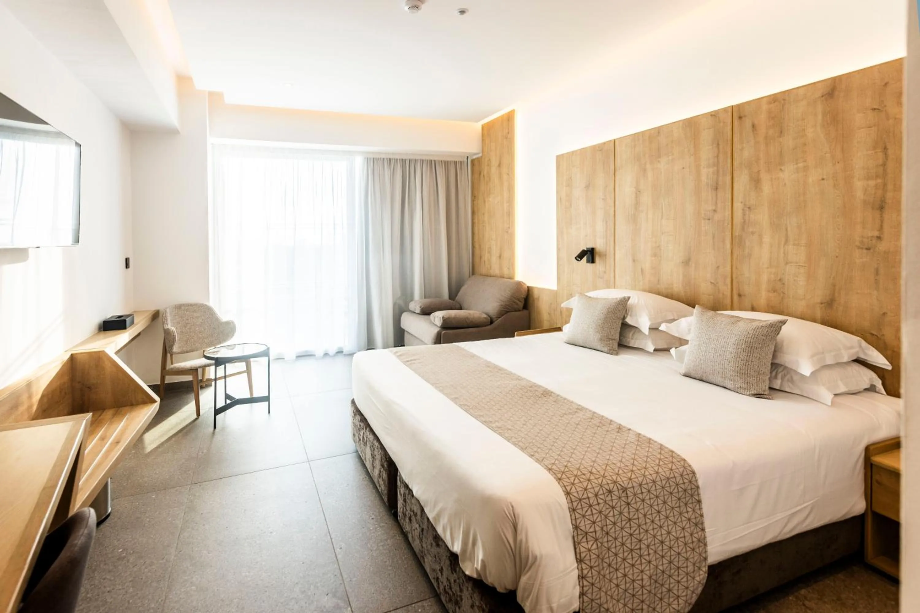 Bed in Sofianna Resort & Spa