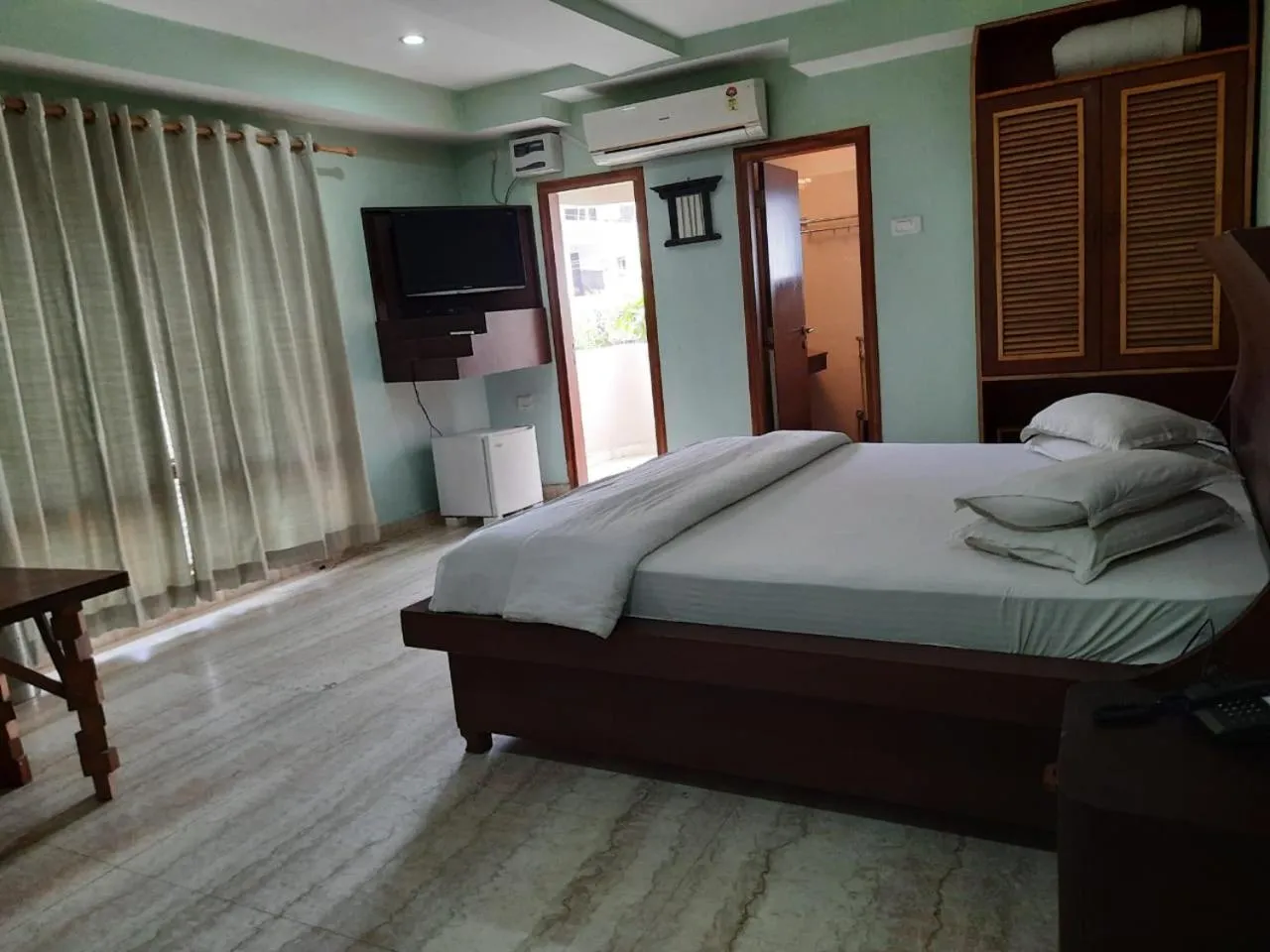 Bed in Hotel Rains Inn