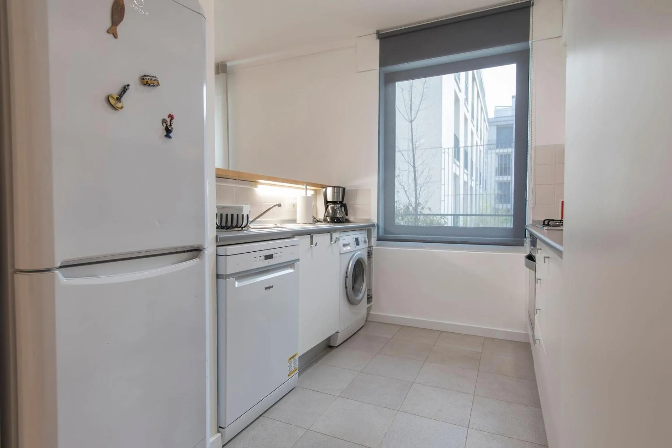 Kitchen or kitchenette in LovelyStay - Family-Friendly Apartment Downtown