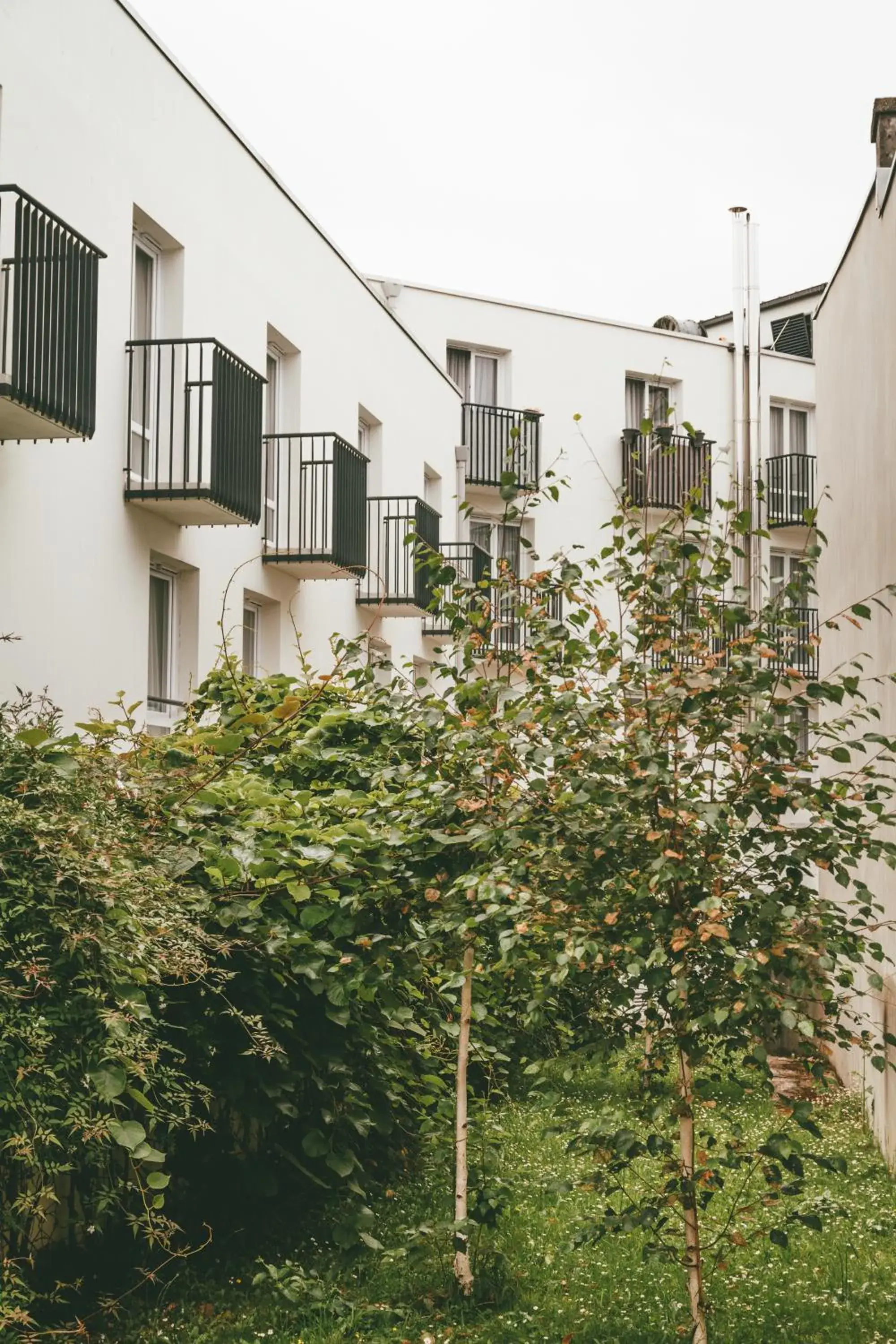 Property building in Terres de France - Appart'Hotel Quimper Bretagne Property building in Terres de France - Appart'Hotel Quimper Bretagne