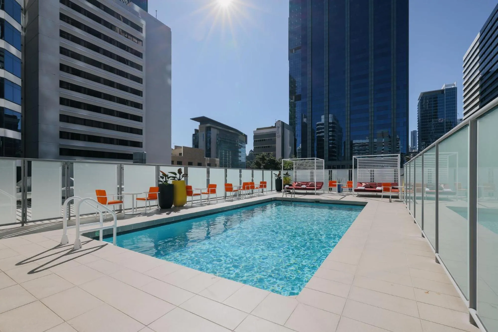 Swimming pool in Hotel Indigo Brisbane City Centre by IHG