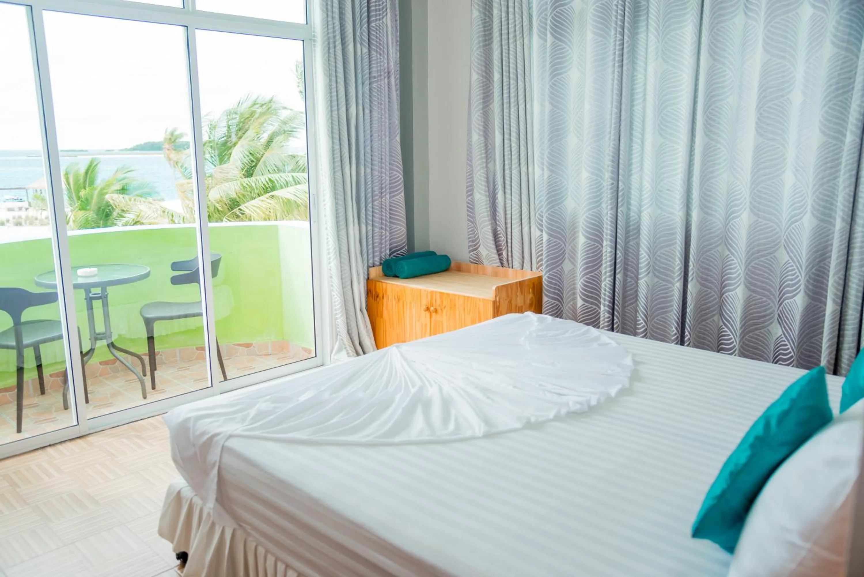 Bed in IRIS Beach Residence