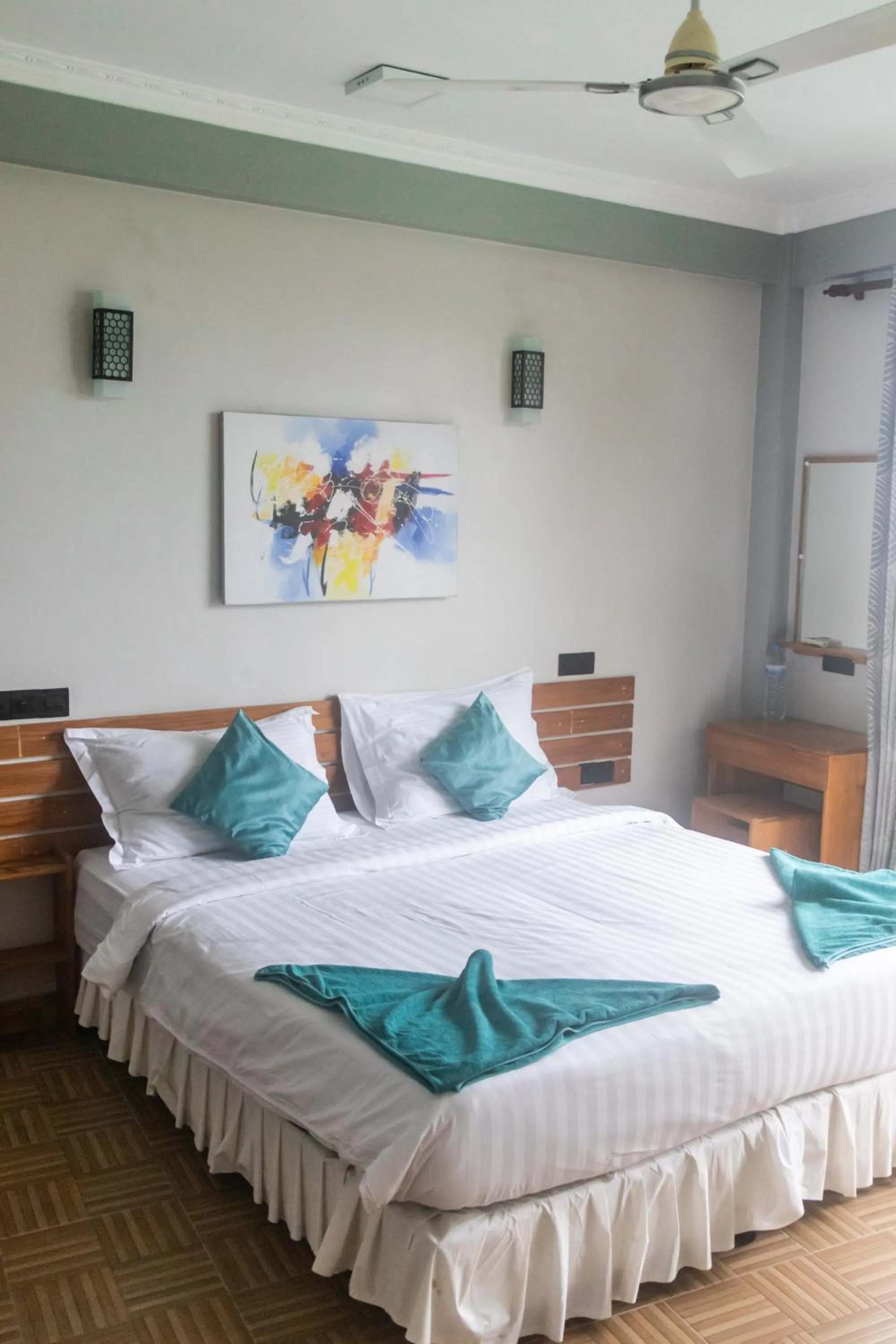 Bed in IRIS Beach Residence