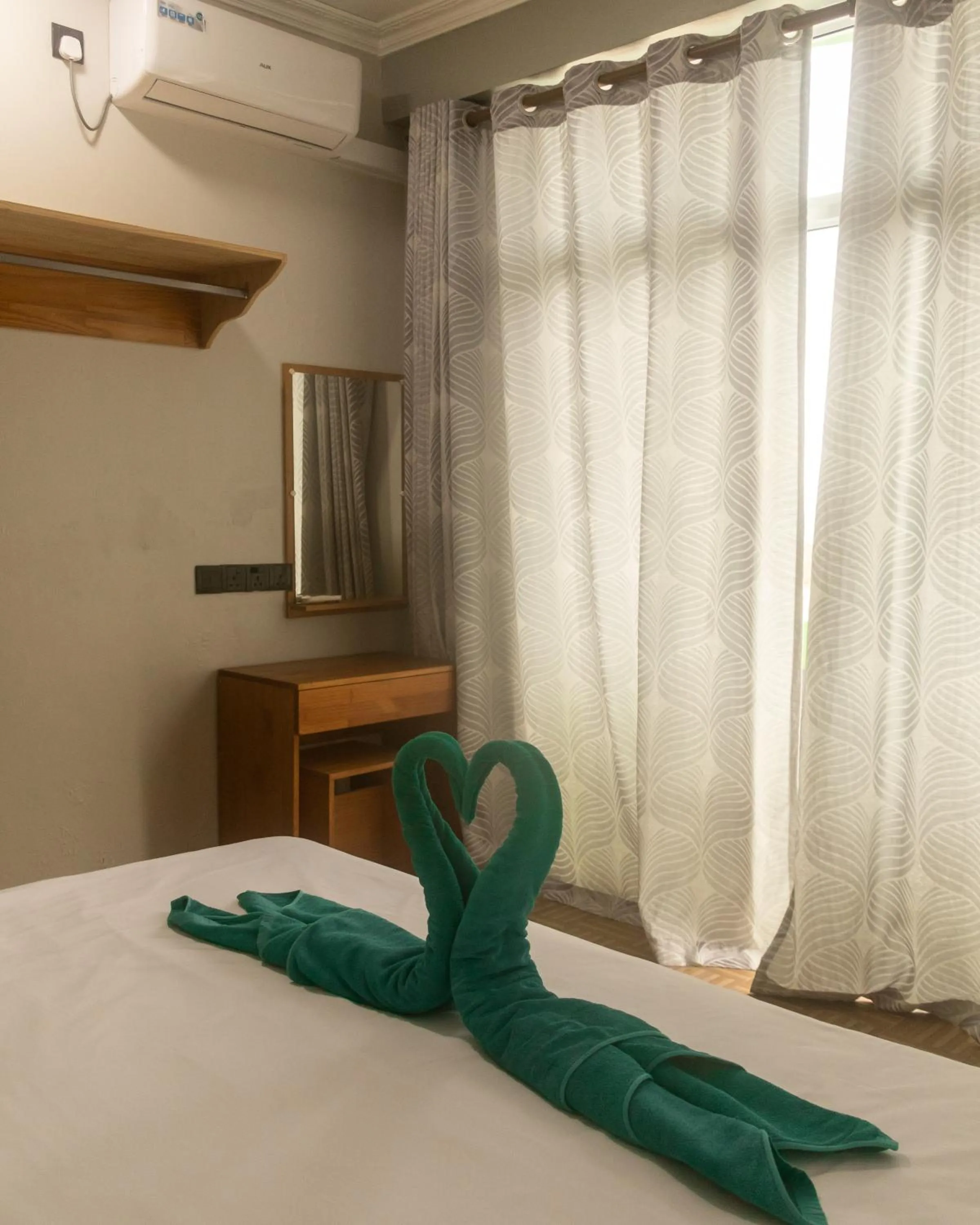 Photo of the whole room, Bed in IRIS Beach Residence