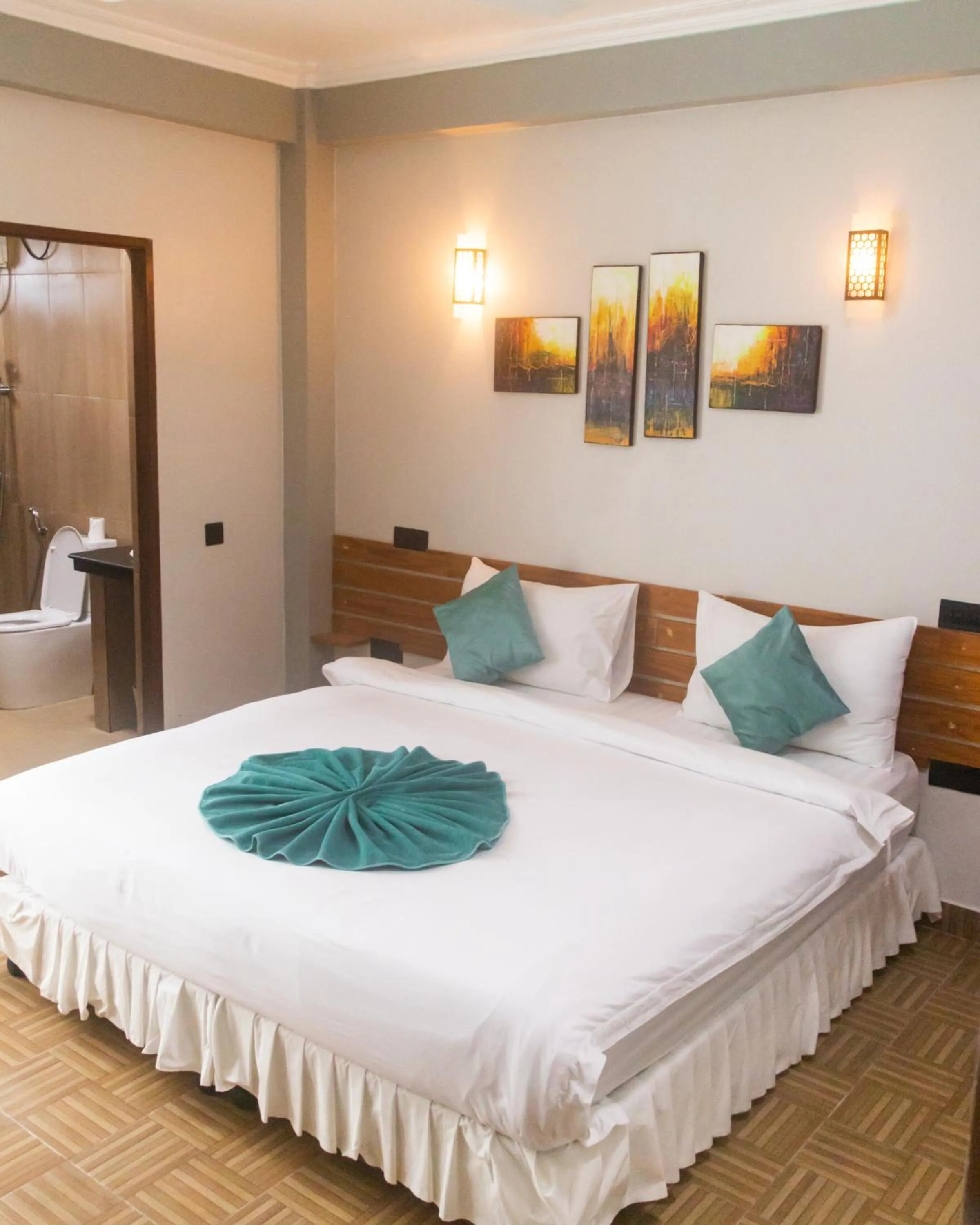 Photo of the whole room, Bed in IRIS Beach Residence