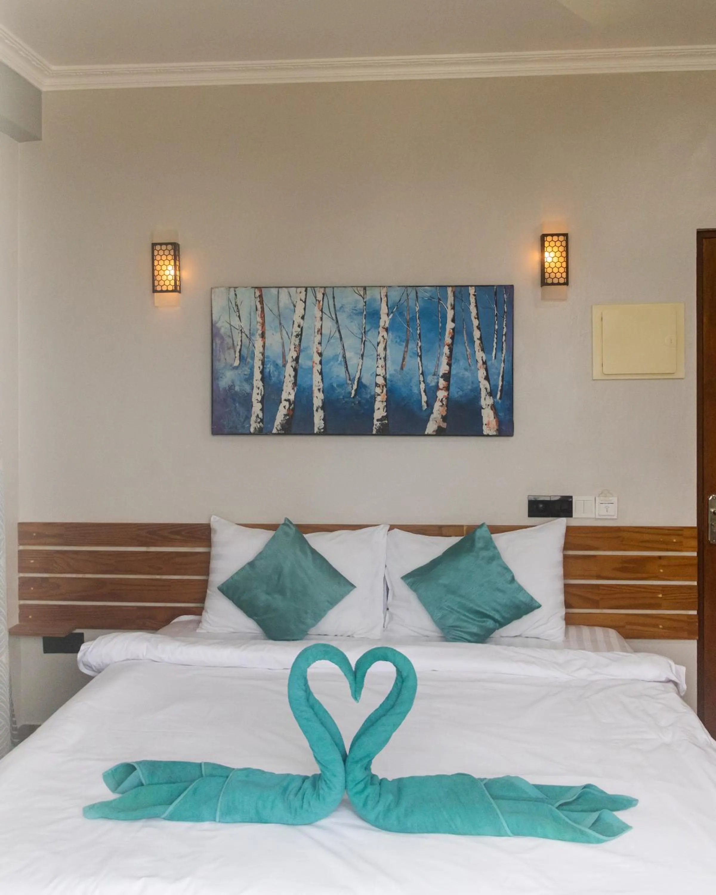 Bed in IRIS Beach Residence