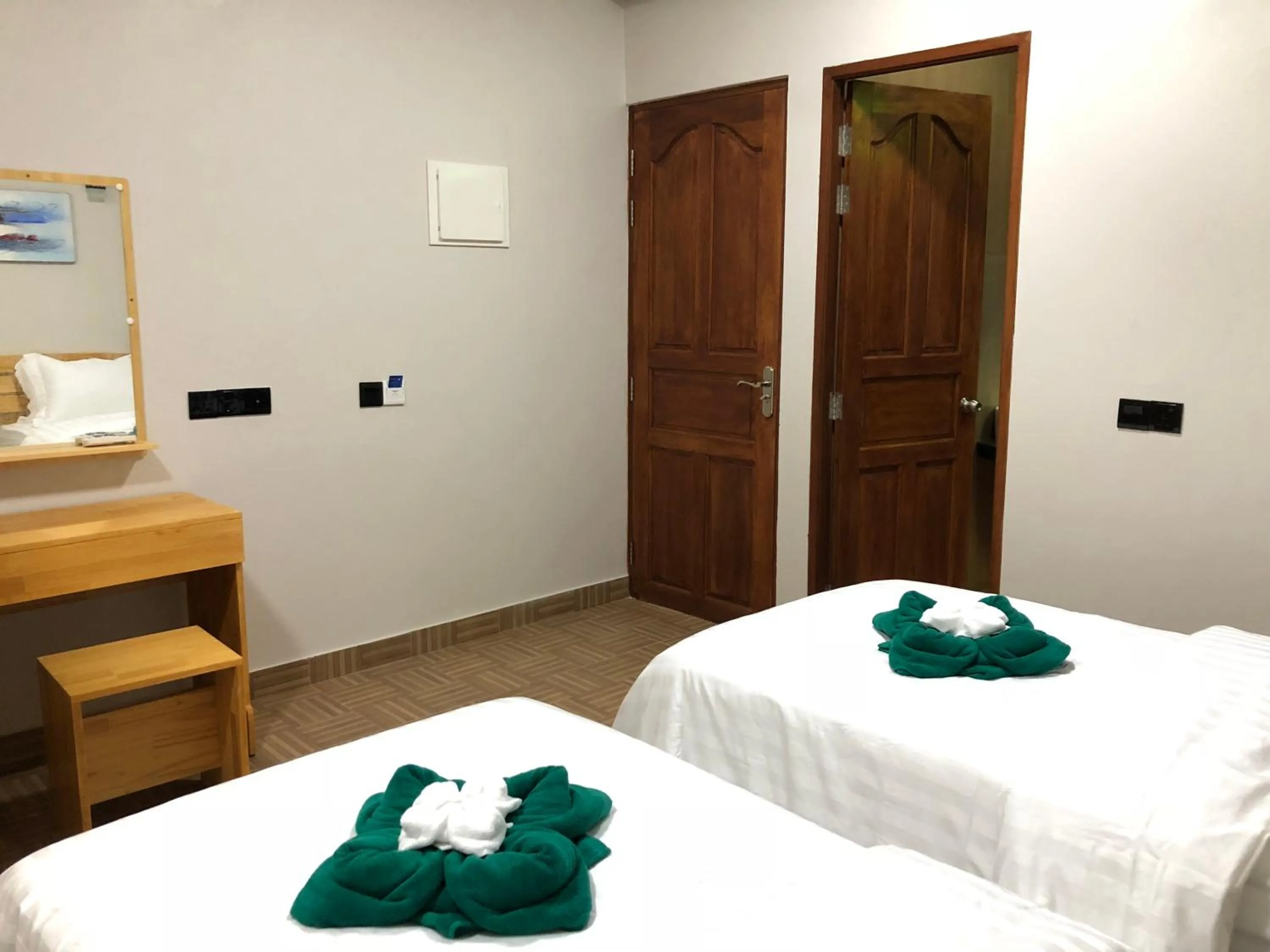 Bed in IRIS Beach Residence