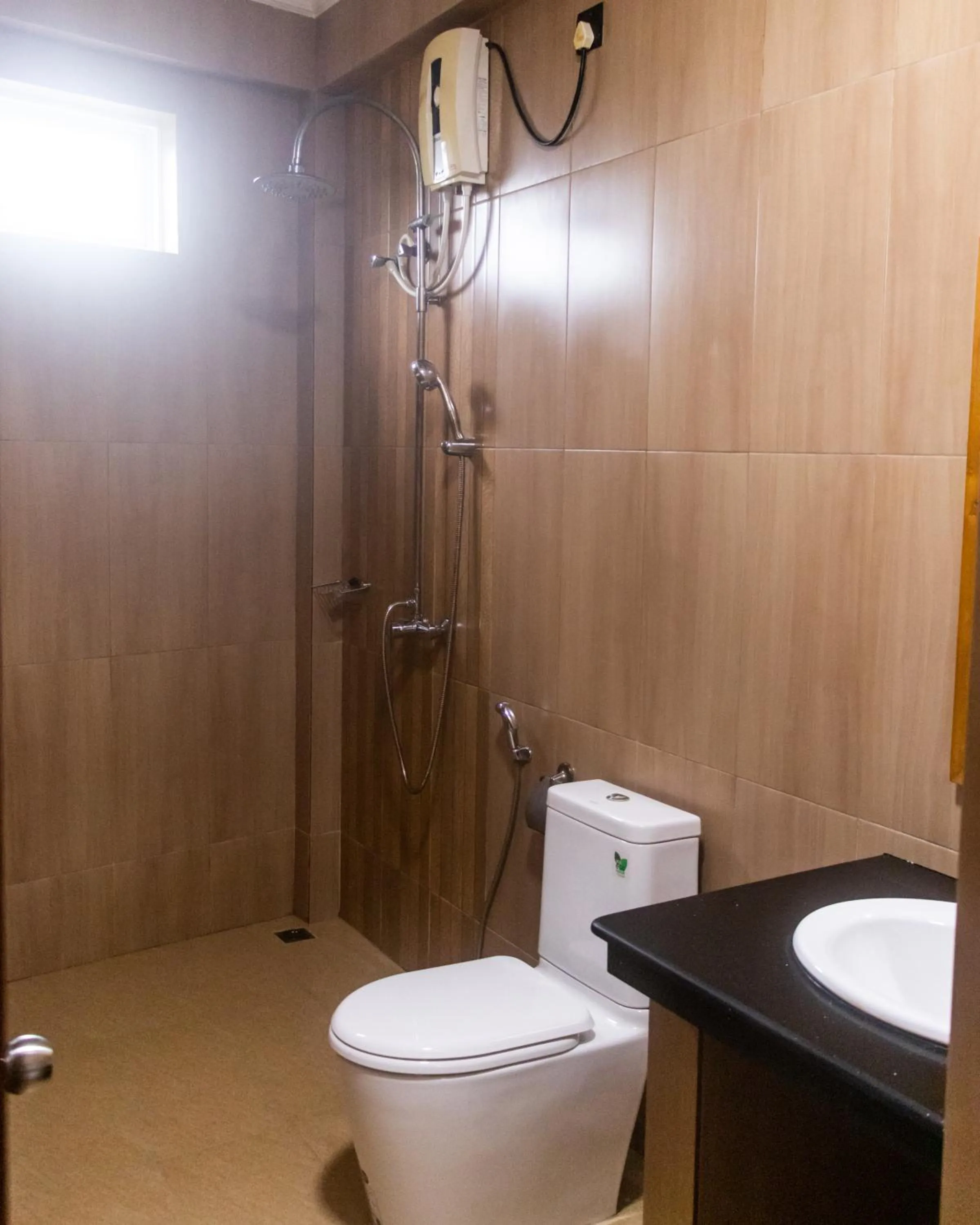 Shower in IRIS Beach Residence