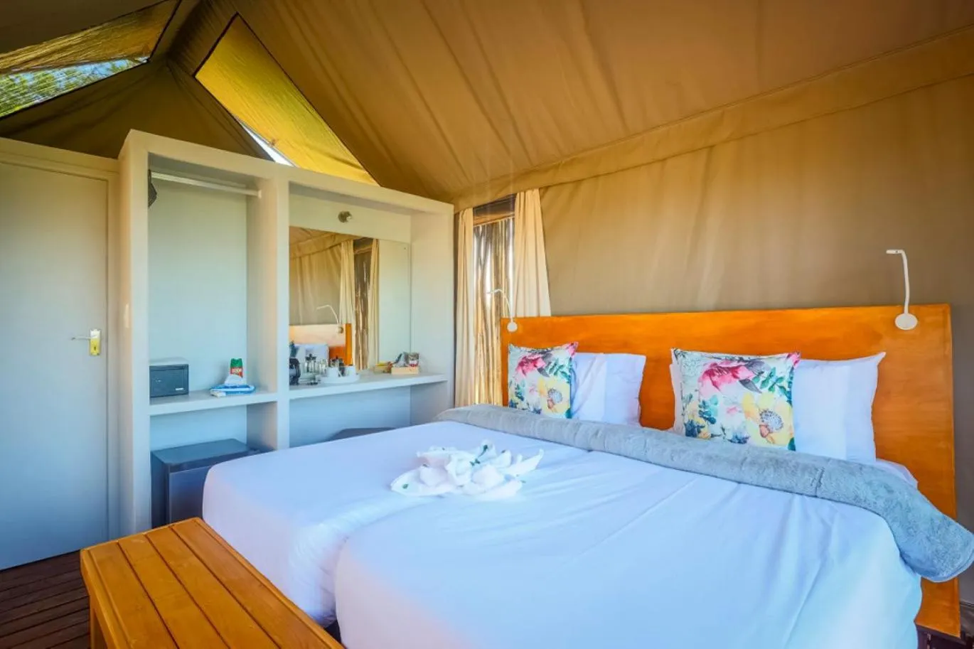 Bed in Ndhula Luxury Tented Lodge