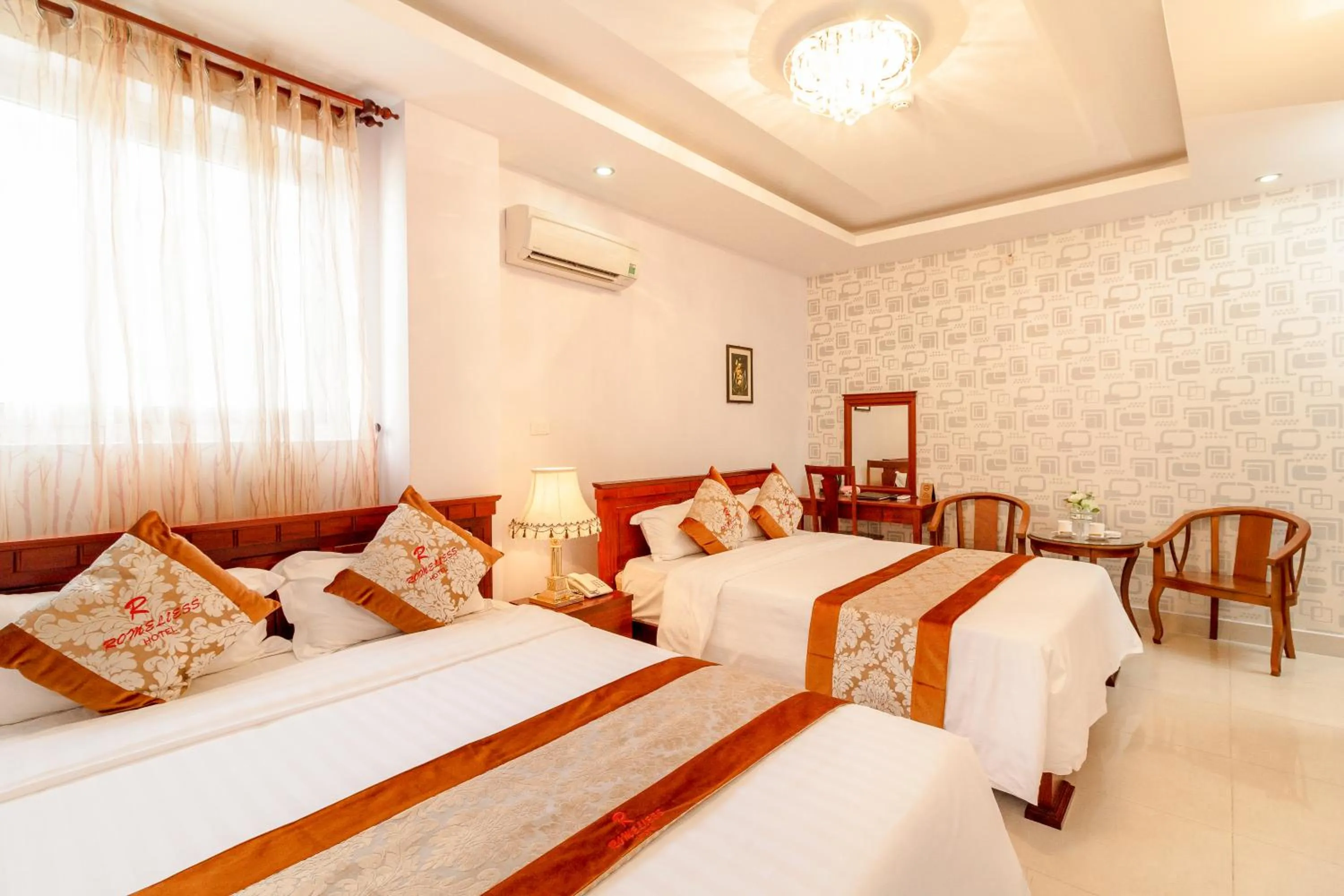 Bed in Romeliess Hotel