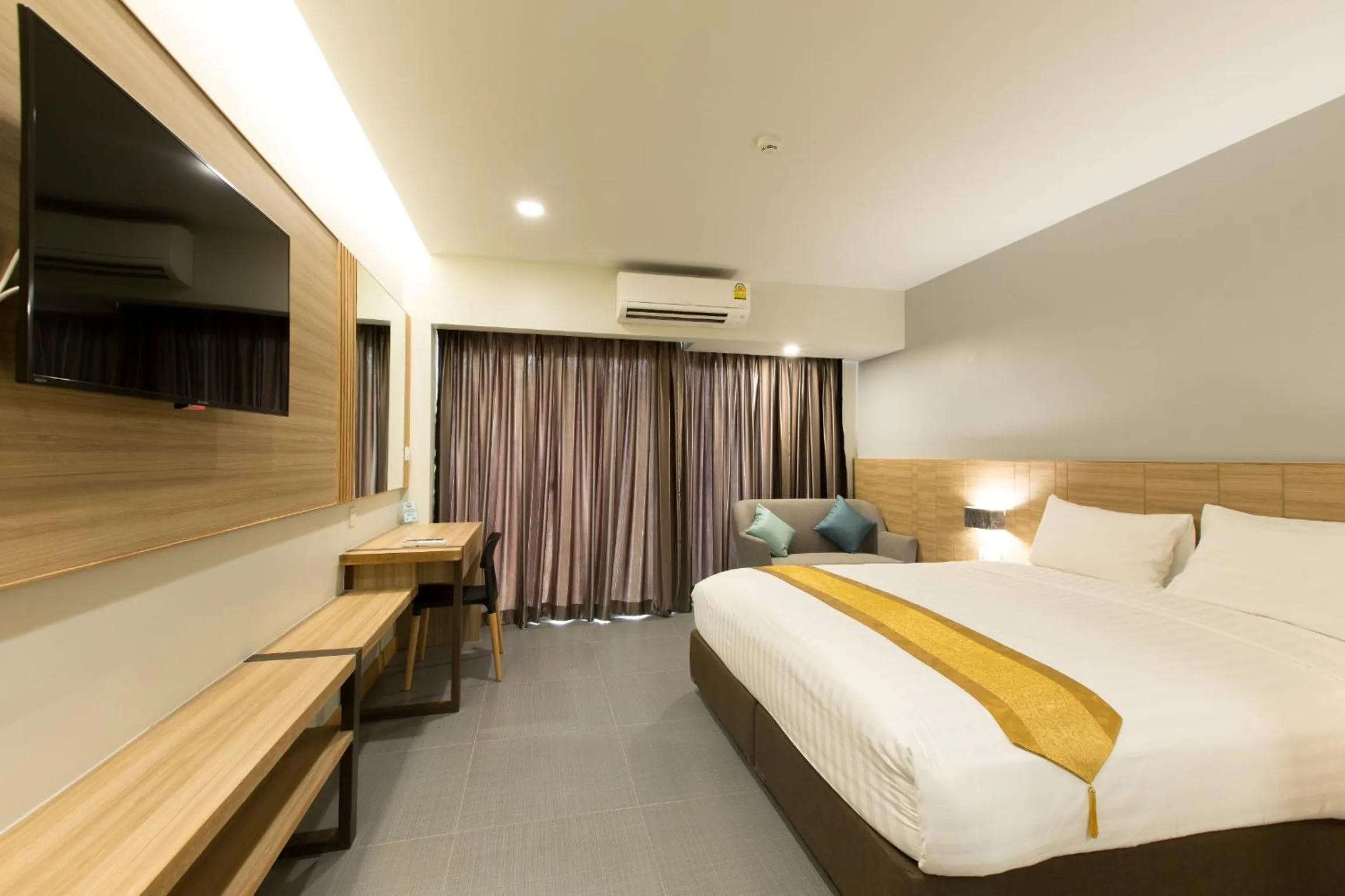 Bed in Paragon Grand Resort