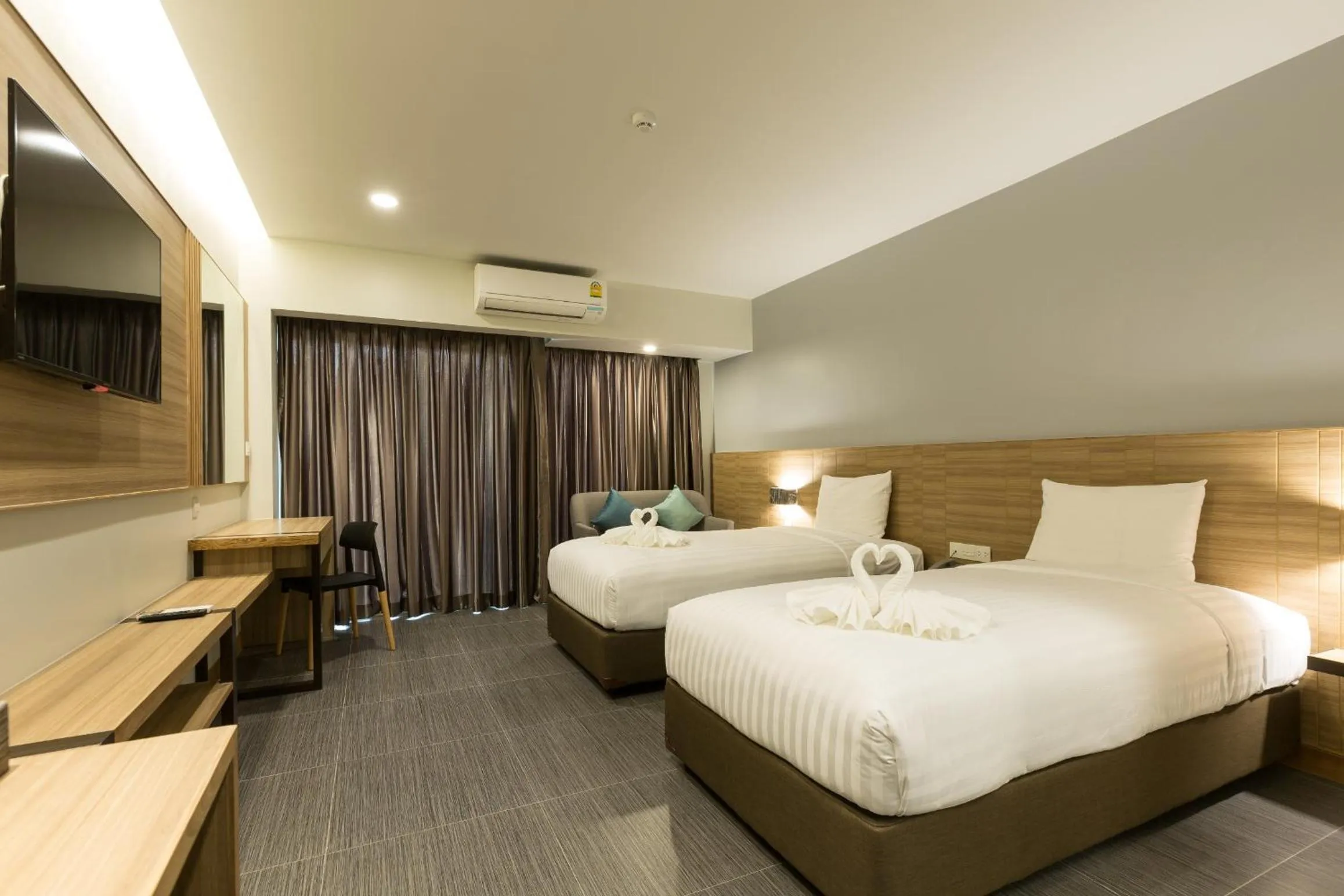 Bed in Paragon Grand Resort