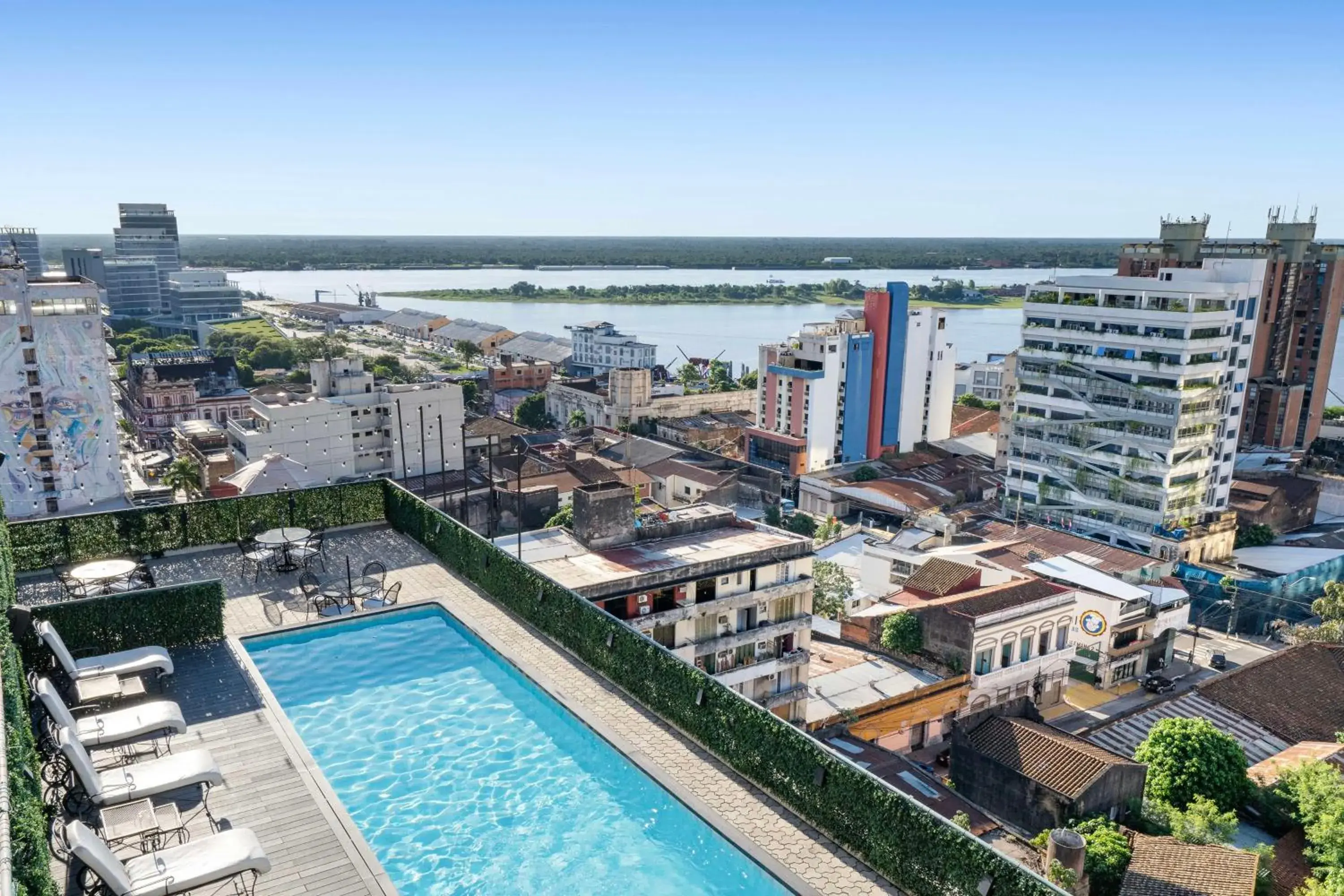 Pool view in Palmaroga Hotel Asuncion, Tapestry Collection by Hilton Pool view in Palmaroga Hotel Asuncion, Tapestry Collection by Hilton