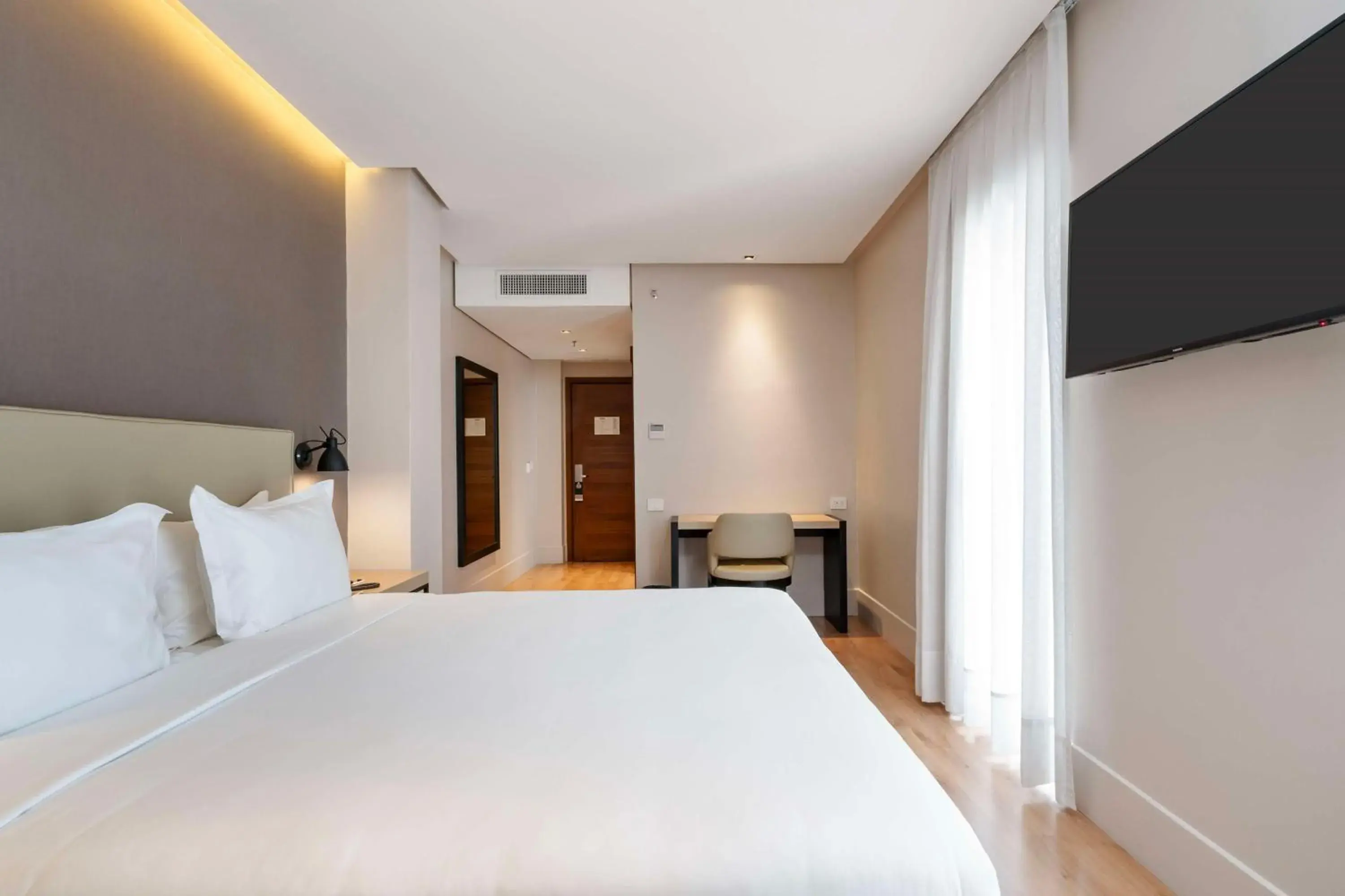 Bedroom, Bed in Palmaroga Hotel Asuncion, Tapestry Collection by Hilton Bedroom, Bed in Palmaroga Hotel Asuncion, Tapestry Collection by Hilton